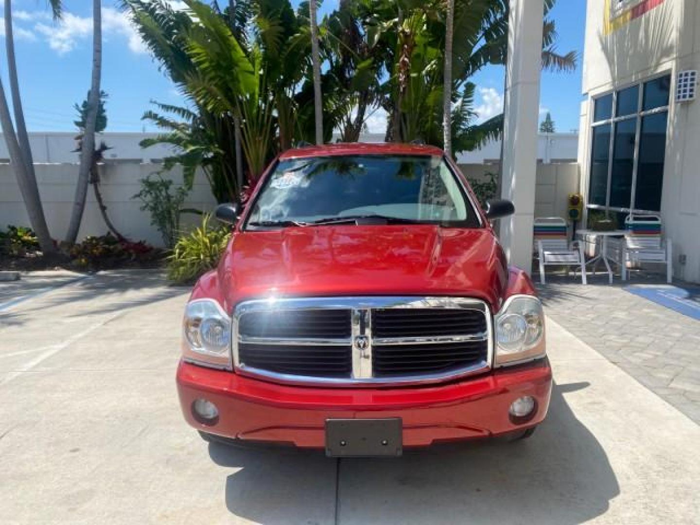 2006 Flame Red /Med Slate Gray Dodge Durango 3RD ROW SLT LOW MILES 34,957 (1D4HD48N06F) with an 4.7L V8 Magnum Engine engine, Automatic transmission, located at 4701 North Dixie Hwy, Pompano Beach, FL, 33064, (954) 422-2889, 26.240938, -80.123474 - OUR WEBPAGE FLORIDACARS1.COM HAS OVER 100 PHOTOS AND FREE CARFAX LINK 2006 DODGE DURANGO SLT 50 SERVICE RECORDS FULLY MAINTANED VIN: 1D4HD48N06F182662 1 D 4 H D 4 8 N 0 6 F 1 8 2 6 6 2 4 DOOR WAGON/SPORT UTILITY 4.7L V8 F OHV GASOLINE REAR WHEEL DRIVE Top Features Alloy Wheels Rear Entertainment Sys - Photo#2