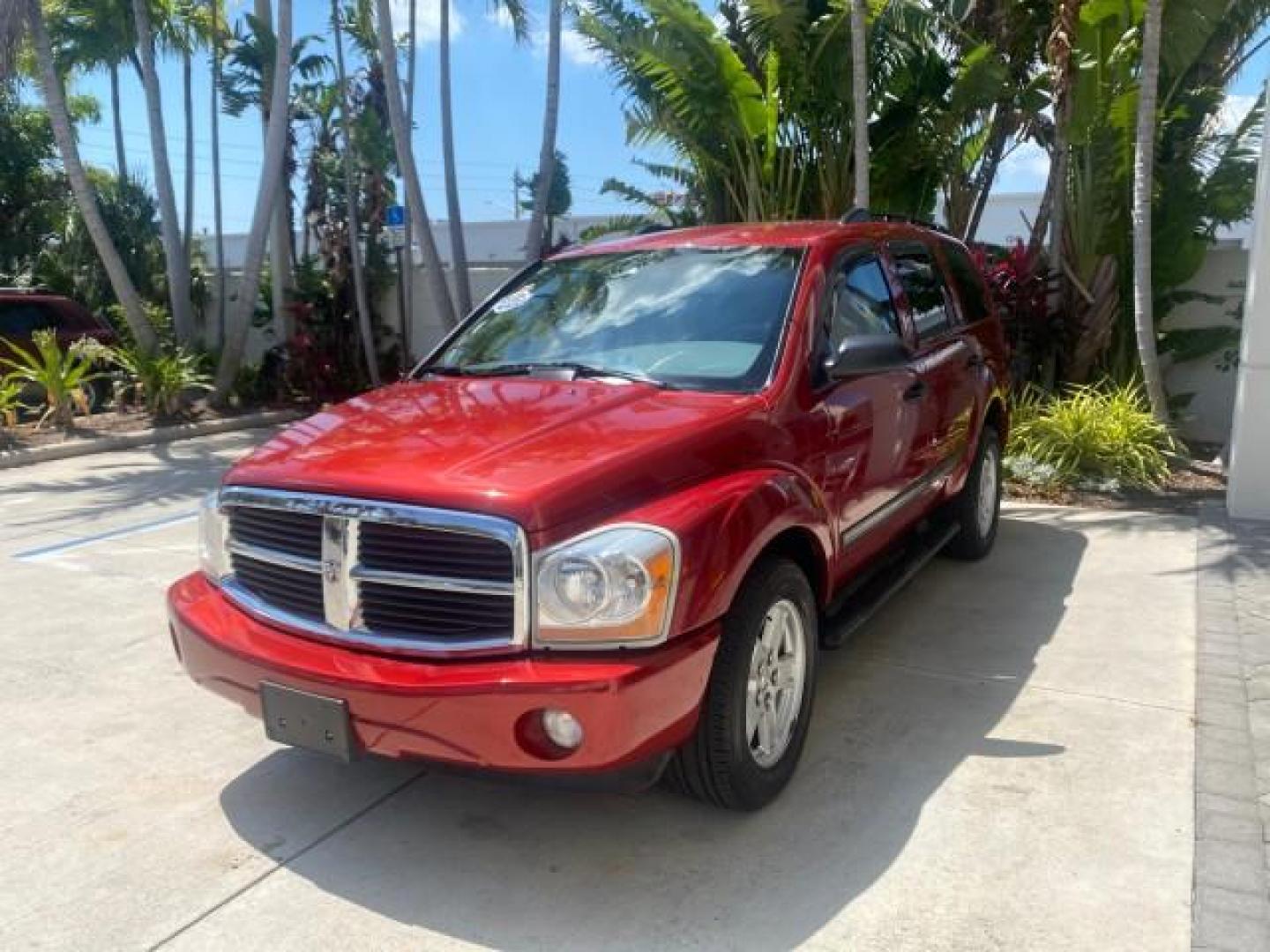 2006 Flame Red /Med Slate Gray Dodge Durango 3RD ROW SLT LOW MILES 34,957 (1D4HD48N06F) with an 4.7L V8 Magnum Engine engine, Automatic transmission, located at 4701 North Dixie Hwy, Pompano Beach, FL, 33064, (954) 422-2889, 26.240938, -80.123474 - OUR WEBPAGE FLORIDACARS1.COM HAS OVER 100 PHOTOS AND FREE CARFAX LINK 2006 DODGE DURANGO SLT 50 SERVICE RECORDS FULLY MAINTANED VIN: 1D4HD48N06F182662 1 D 4 H D 4 8 N 0 6 F 1 8 2 6 6 2 4 DOOR WAGON/SPORT UTILITY 4.7L V8 F OHV GASOLINE REAR WHEEL DRIVE Top Features Alloy Wheels Rear Entertainment Sys - Photo#3
