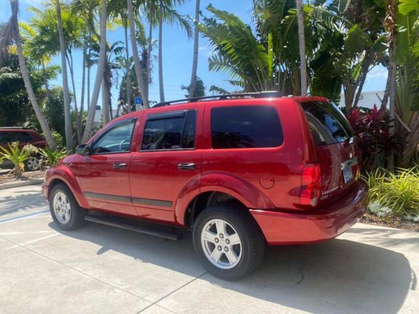 2006 Flame Red /Med Slate Gray Dodge Durango 3RD ROW SLT LOW MILES 34,957 (1D4HD48N06F) with an 4.7L V8 Magnum Engine engine, Automatic transmission, located at 4701 North Dixie Hwy, Pompano Beach, FL, 33064, (954) 422-2889, 26.240938, -80.123474 - OUR WEBPAGE FLORIDACARS1.COM HAS OVER 100 PHOTOS AND FREE CARFAX LINK 2006 DODGE DURANGO SLT 50 SERVICE RECORDS FULLY MAINTANED VIN: 1D4HD48N06F182662 1 D 4 H D 4 8 N 0 6 F 1 8 2 6 6 2 4 DOOR WAGON/SPORT UTILITY 4.7L V8 F OHV GASOLINE REAR WHEEL DRIVE Top Features Alloy Wheels Rear Entertainment Sys - Photo#5