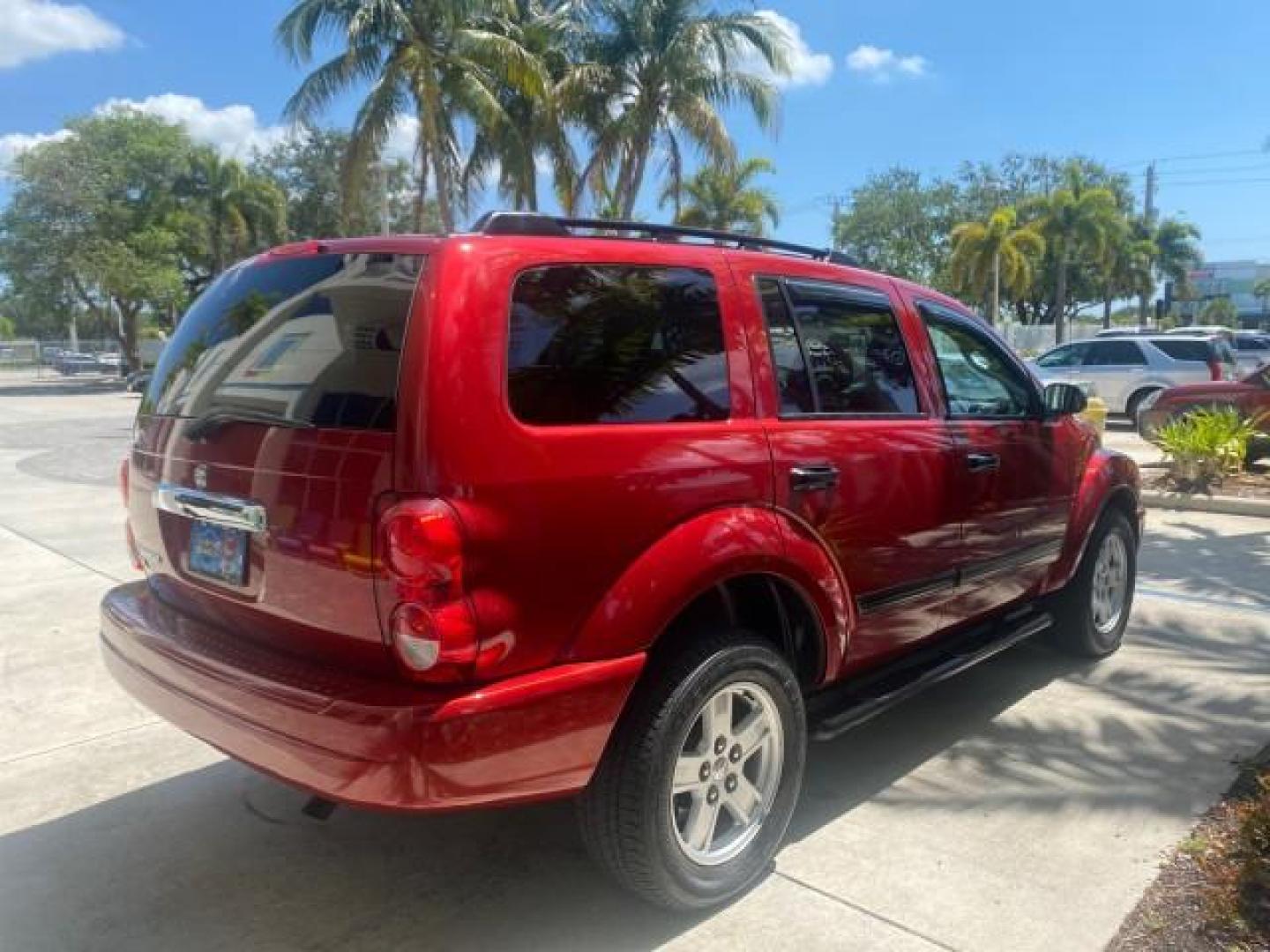2006 Flame Red /Med Slate Gray Dodge Durango 3RD ROW SLT LOW MILES 34,957 (1D4HD48N06F) with an 4.7L V8 Magnum Engine engine, Automatic transmission, located at 4701 North Dixie Hwy, Pompano Beach, FL, 33064, (954) 422-2889, 26.240938, -80.123474 - OUR WEBPAGE FLORIDACARS1.COM HAS OVER 100 PHOTOS AND FREE CARFAX LINK 2006 DODGE DURANGO SLT 50 SERVICE RECORDS FULLY MAINTANED VIN: 1D4HD48N06F182662 1 D 4 H D 4 8 N 0 6 F 1 8 2 6 6 2 4 DOOR WAGON/SPORT UTILITY 4.7L V8 F OHV GASOLINE REAR WHEEL DRIVE Top Features Alloy Wheels Rear Entertainment Sys - Photo#7