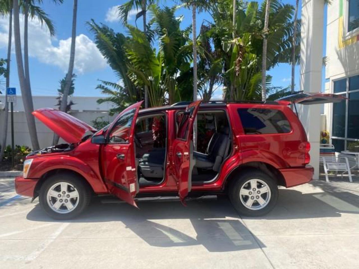 2006 Flame Red /Med Slate Gray Dodge Durango 3RD ROW SLT LOW MILES 34,957 (1D4HD48N06F) with an 4.7L V8 Magnum Engine engine, Automatic transmission, located at 4701 North Dixie Hwy, Pompano Beach, FL, 33064, (954) 422-2889, 26.240938, -80.123474 - OUR WEBPAGE FLORIDACARS1.COM HAS OVER 100 PHOTOS AND FREE CARFAX LINK 2006 DODGE DURANGO SLT 50 SERVICE RECORDS FULLY MAINTANED VIN: 1D4HD48N06F182662 1 D 4 H D 4 8 N 0 6 F 1 8 2 6 6 2 4 DOOR WAGON/SPORT UTILITY 4.7L V8 F OHV GASOLINE REAR WHEEL DRIVE Top Features Alloy Wheels Rear Entertainment Sys - Photo#8