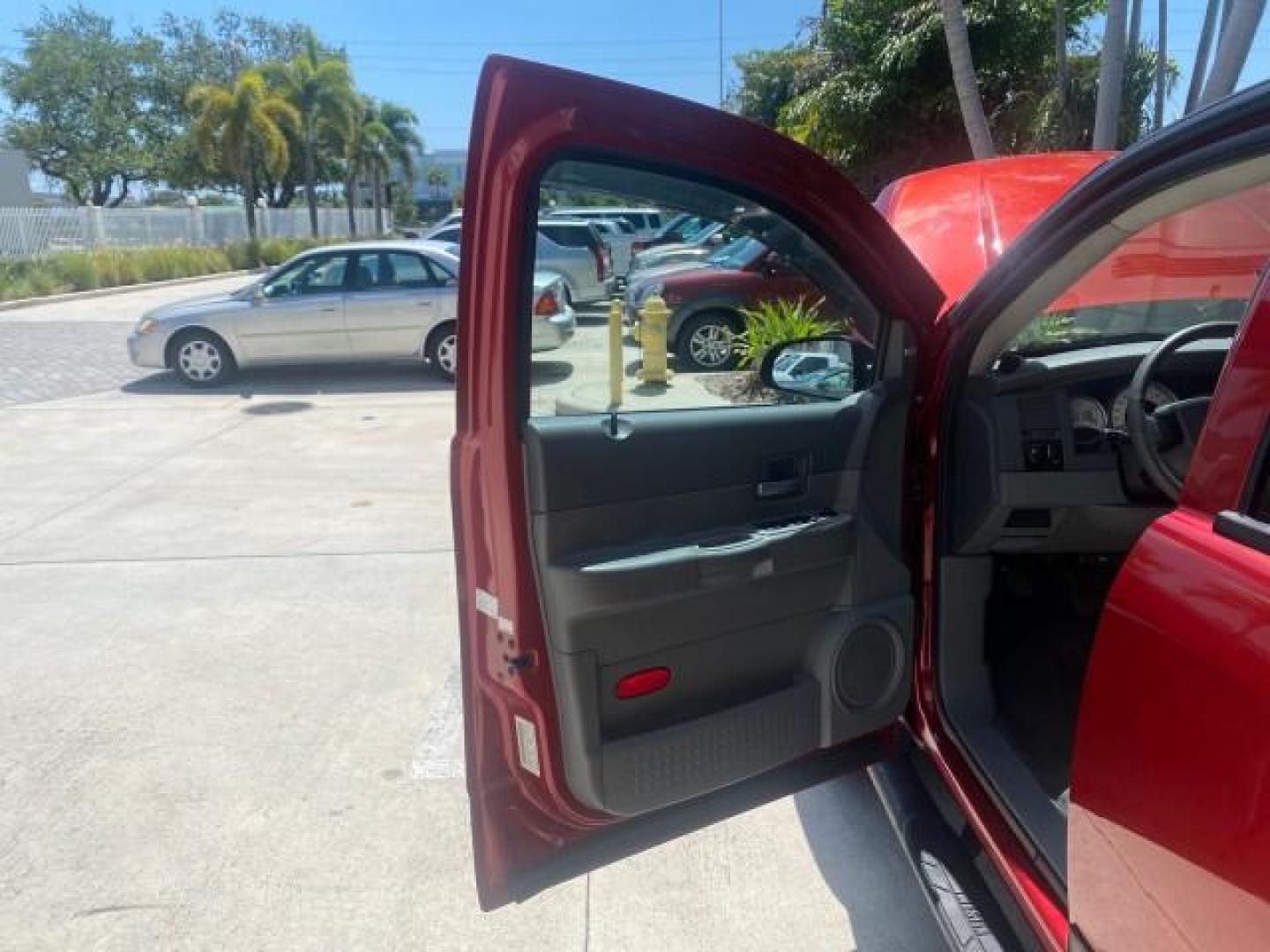 2006 Flame Red /Med Slate Gray Dodge Durango 3RD ROW SLT LOW MILES 34,957 (1D4HD48N06F) with an 4.7L V8 Magnum Engine engine, Automatic transmission, located at 4701 North Dixie Hwy, Pompano Beach, FL, 33064, (954) 422-2889, 26.240938, -80.123474 - OUR WEBPAGE FLORIDACARS1.COM HAS OVER 100 PHOTOS AND FREE CARFAX LINK 2006 DODGE DURANGO SLT 50 SERVICE RECORDS FULLY MAINTANED VIN: 1D4HD48N06F182662 1 D 4 H D 4 8 N 0 6 F 1 8 2 6 6 2 4 DOOR WAGON/SPORT UTILITY 4.7L V8 F OHV GASOLINE REAR WHEEL DRIVE Top Features Alloy Wheels Rear Entertainment Sys - Photo#9