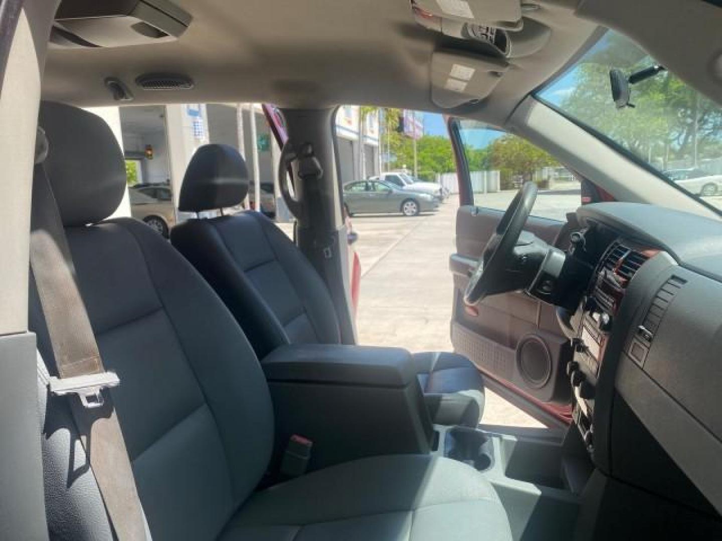 2006 Flame Red /Med Slate Gray Dodge Durango 3RD ROW SLT LOW MILES 34,957 (1D4HD48N06F) with an 4.7L V8 Magnum Engine engine, Automatic transmission, located at 4701 North Dixie Hwy, Pompano Beach, FL, 33064, (954) 422-2889, 26.240938, -80.123474 - OUR WEBPAGE FLORIDACARS1.COM HAS OVER 100 PHOTOS AND FREE CARFAX LINK 2006 DODGE DURANGO SLT 50 SERVICE RECORDS FULLY MAINTANED VIN: 1D4HD48N06F182662 1 D 4 H D 4 8 N 0 6 F 1 8 2 6 6 2 4 DOOR WAGON/SPORT UTILITY 4.7L V8 F OHV GASOLINE REAR WHEEL DRIVE Top Features Alloy Wheels Rear Entertainment Sys - Photo#12