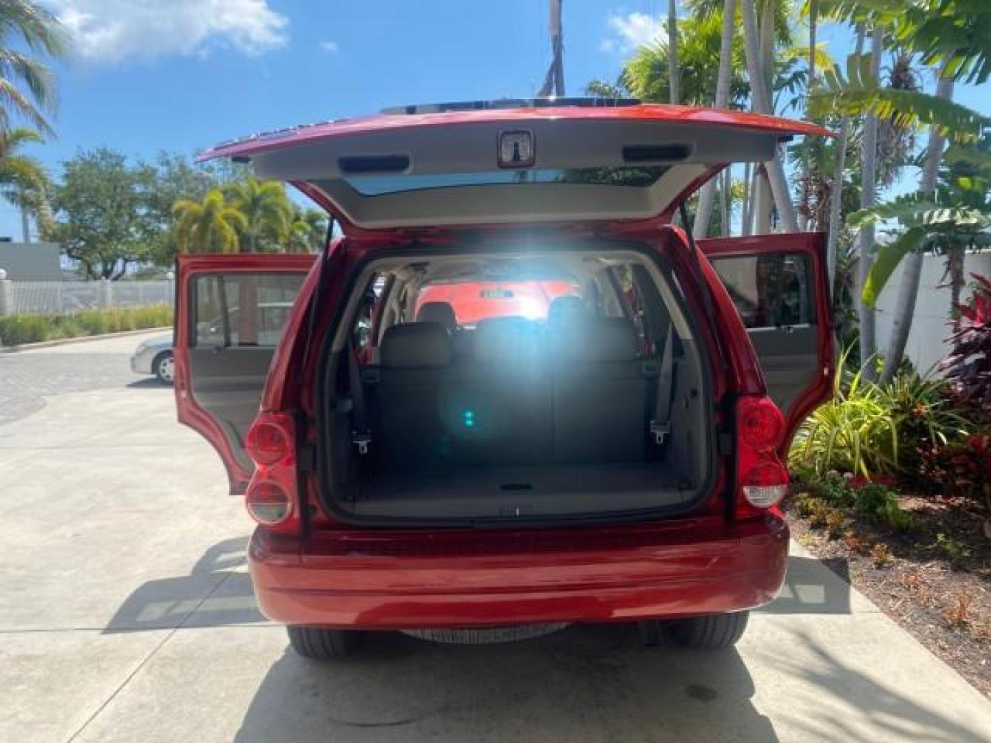 2006 Flame Red /Med Slate Gray Dodge Durango 3RD ROW SLT LOW MILES 34,957 (1D4HD48N06F) with an 4.7L V8 Magnum Engine engine, Automatic transmission, located at 4701 North Dixie Hwy, Pompano Beach, FL, 33064, (954) 422-2889, 26.240938, -80.123474 - OUR WEBPAGE FLORIDACARS1.COM HAS OVER 100 PHOTOS AND FREE CARFAX LINK 2006 DODGE DURANGO SLT 50 SERVICE RECORDS FULLY MAINTANED VIN: 1D4HD48N06F182662 1 D 4 H D 4 8 N 0 6 F 1 8 2 6 6 2 4 DOOR WAGON/SPORT UTILITY 4.7L V8 F OHV GASOLINE REAR WHEEL DRIVE Top Features Alloy Wheels Rear Entertainment Sys - Photo#15