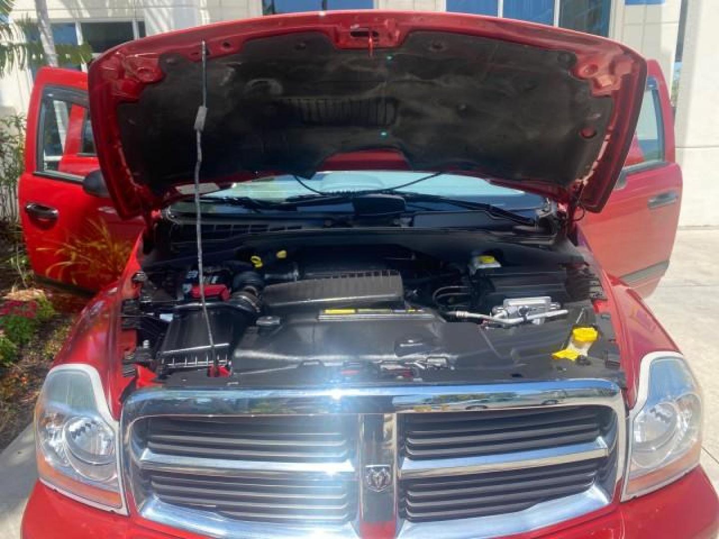 2006 Flame Red /Med Slate Gray Dodge Durango 3RD ROW SLT LOW MILES 34,957 (1D4HD48N06F) with an 4.7L V8 Magnum Engine engine, Automatic transmission, located at 4701 North Dixie Hwy, Pompano Beach, FL, 33064, (954) 422-2889, 26.240938, -80.123474 - OUR WEBPAGE FLORIDACARS1.COM HAS OVER 100 PHOTOS AND FREE CARFAX LINK 2006 DODGE DURANGO SLT 50 SERVICE RECORDS FULLY MAINTANED VIN: 1D4HD48N06F182662 1 D 4 H D 4 8 N 0 6 F 1 8 2 6 6 2 4 DOOR WAGON/SPORT UTILITY 4.7L V8 F OHV GASOLINE REAR WHEEL DRIVE Top Features Alloy Wheels Rear Entertainment Sys - Photo#17