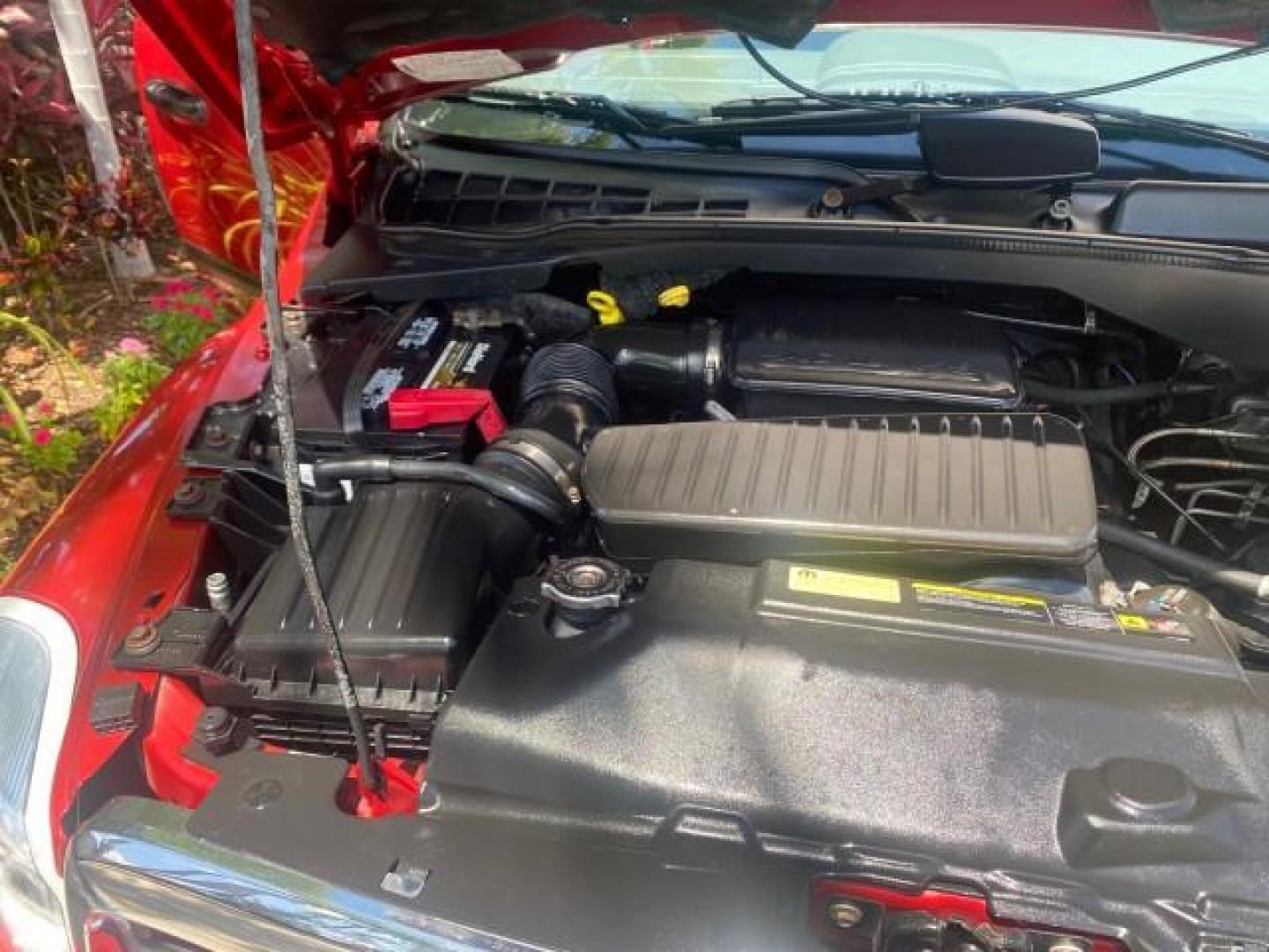 2006 Flame Red /Med Slate Gray Dodge Durango 3RD ROW SLT LOW MILES 34,957 (1D4HD48N06F) with an 4.7L V8 Magnum Engine engine, Automatic transmission, located at 4701 North Dixie Hwy, Pompano Beach, FL, 33064, (954) 422-2889, 26.240938, -80.123474 - OUR WEBPAGE FLORIDACARS1.COM HAS OVER 100 PHOTOS AND FREE CARFAX LINK 2006 DODGE DURANGO SLT 50 SERVICE RECORDS FULLY MAINTANED VIN: 1D4HD48N06F182662 1 D 4 H D 4 8 N 0 6 F 1 8 2 6 6 2 4 DOOR WAGON/SPORT UTILITY 4.7L V8 F OHV GASOLINE REAR WHEEL DRIVE Top Features Alloy Wheels Rear Entertainment Sys - Photo#25