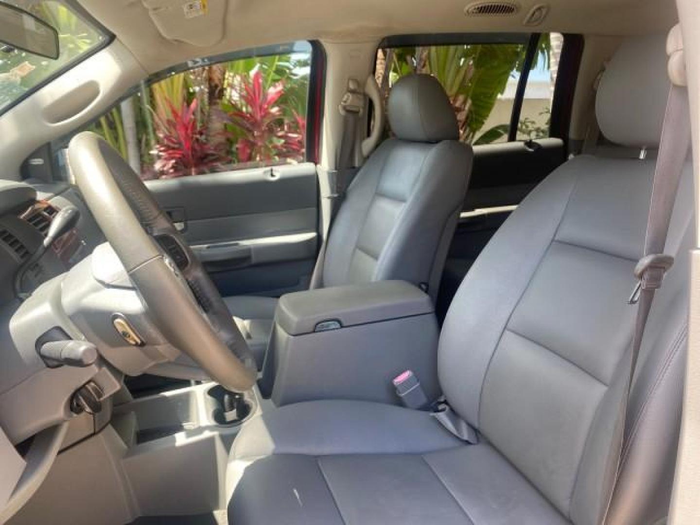 2006 Flame Red /Med Slate Gray Dodge Durango 3RD ROW SLT LOW MILES 34,957 (1D4HD48N06F) with an 4.7L V8 Magnum Engine engine, Automatic transmission, located at 4701 North Dixie Hwy, Pompano Beach, FL, 33064, (954) 422-2889, 26.240938, -80.123474 - OUR WEBPAGE FLORIDACARS1.COM HAS OVER 100 PHOTOS AND FREE CARFAX LINK 2006 DODGE DURANGO SLT 50 SERVICE RECORDS FULLY MAINTANED VIN: 1D4HD48N06F182662 1 D 4 H D 4 8 N 0 6 F 1 8 2 6 6 2 4 DOOR WAGON/SPORT UTILITY 4.7L V8 F OHV GASOLINE REAR WHEEL DRIVE Top Features Alloy Wheels Rear Entertainment Sys - Photo#33