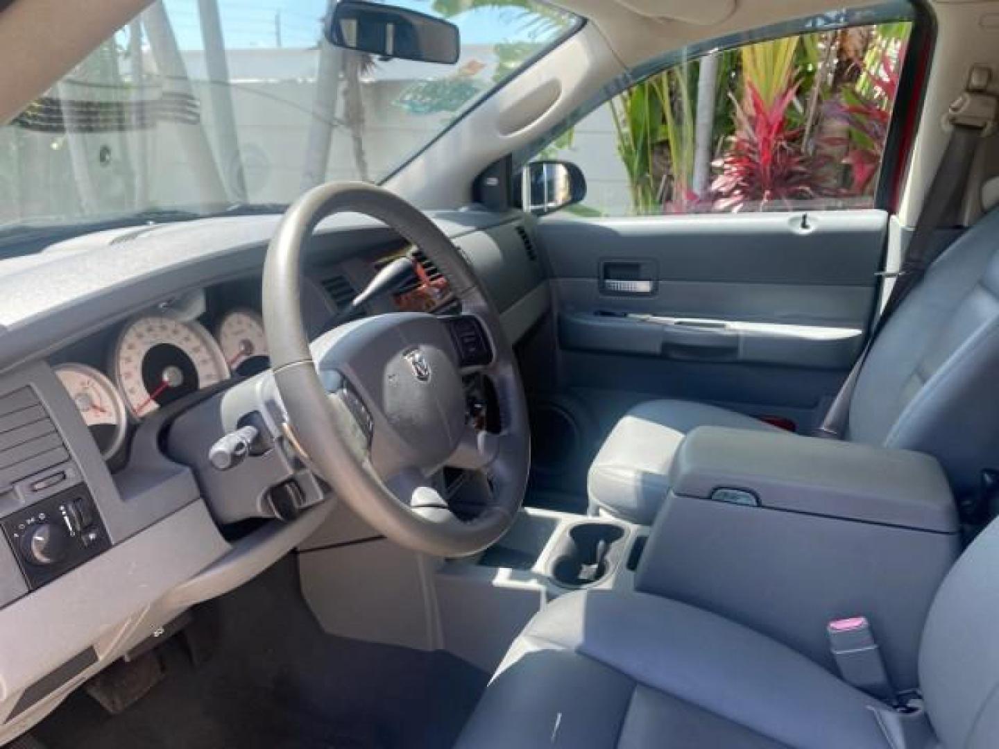 2006 Flame Red /Med Slate Gray Dodge Durango 3RD ROW SLT LOW MILES 34,957 (1D4HD48N06F) with an 4.7L V8 Magnum Engine engine, Automatic transmission, located at 4701 North Dixie Hwy, Pompano Beach, FL, 33064, (954) 422-2889, 26.240938, -80.123474 - OUR WEBPAGE FLORIDACARS1.COM HAS OVER 100 PHOTOS AND FREE CARFAX LINK 2006 DODGE DURANGO SLT 50 SERVICE RECORDS FULLY MAINTANED VIN: 1D4HD48N06F182662 1 D 4 H D 4 8 N 0 6 F 1 8 2 6 6 2 4 DOOR WAGON/SPORT UTILITY 4.7L V8 F OHV GASOLINE REAR WHEEL DRIVE Top Features Alloy Wheels Rear Entertainment Sys - Photo#35