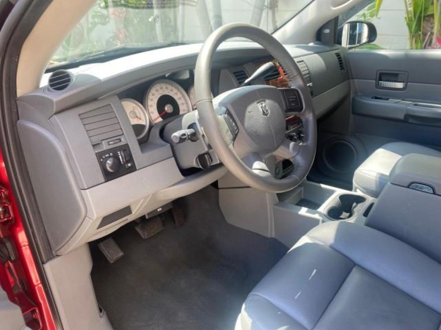 2006 Flame Red /Med Slate Gray Dodge Durango 3RD ROW SLT LOW MILES 34,957 (1D4HD48N06F) with an 4.7L V8 Magnum Engine engine, Automatic transmission, located at 4701 North Dixie Hwy, Pompano Beach, FL, 33064, (954) 422-2889, 26.240938, -80.123474 - OUR WEBPAGE FLORIDACARS1.COM HAS OVER 100 PHOTOS AND FREE CARFAX LINK 2006 DODGE DURANGO SLT 50 SERVICE RECORDS FULLY MAINTANED VIN: 1D4HD48N06F182662 1 D 4 H D 4 8 N 0 6 F 1 8 2 6 6 2 4 DOOR WAGON/SPORT UTILITY 4.7L V8 F OHV GASOLINE REAR WHEEL DRIVE Top Features Alloy Wheels Rear Entertainment Sys - Photo#36