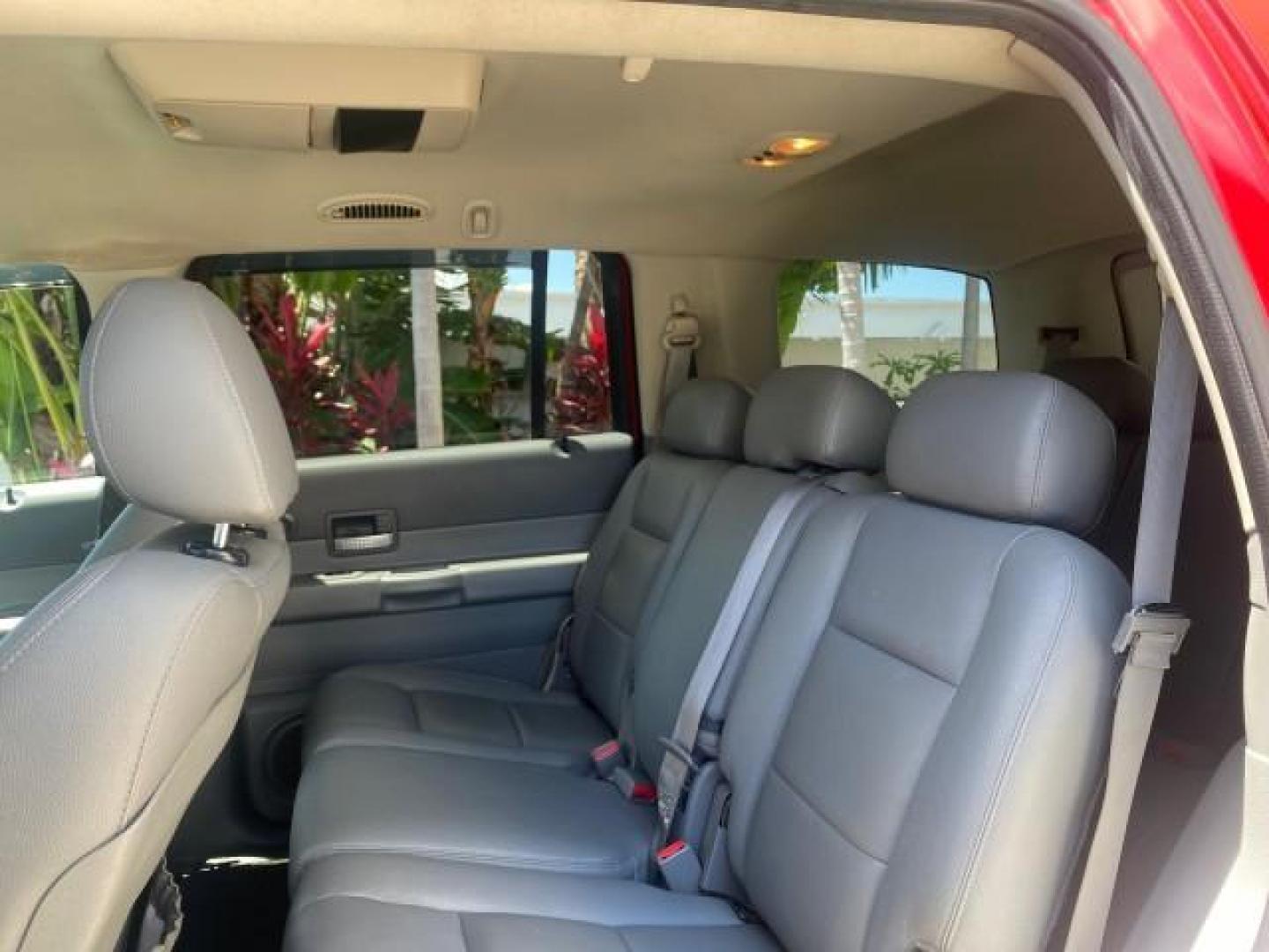 2006 Flame Red /Med Slate Gray Dodge Durango 3RD ROW SLT LOW MILES 34,957 (1D4HD48N06F) with an 4.7L V8 Magnum Engine engine, Automatic transmission, located at 4701 North Dixie Hwy, Pompano Beach, FL, 33064, (954) 422-2889, 26.240938, -80.123474 - OUR WEBPAGE FLORIDACARS1.COM HAS OVER 100 PHOTOS AND FREE CARFAX LINK 2006 DODGE DURANGO SLT 50 SERVICE RECORDS FULLY MAINTANED VIN: 1D4HD48N06F182662 1 D 4 H D 4 8 N 0 6 F 1 8 2 6 6 2 4 DOOR WAGON/SPORT UTILITY 4.7L V8 F OHV GASOLINE REAR WHEEL DRIVE Top Features Alloy Wheels Rear Entertainment Sys - Photo#62