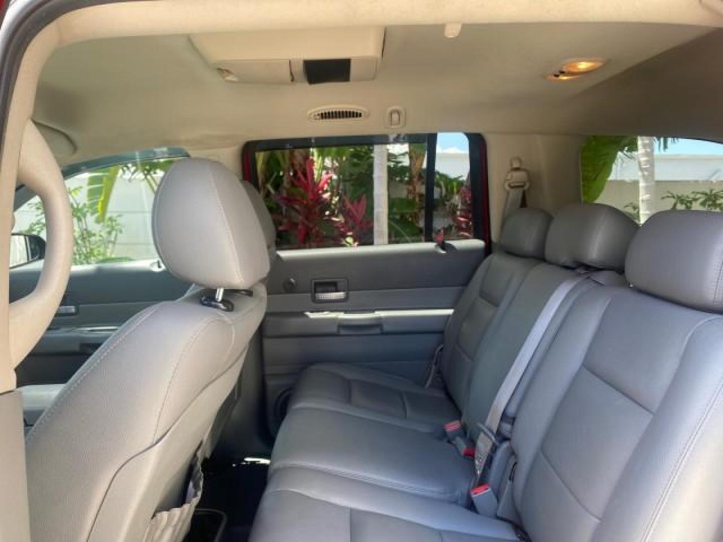 2006 Flame Red /Med Slate Gray Dodge Durango 3RD ROW SLT LOW MILES 34,957 (1D4HD48N06F) with an 4.7L V8 Magnum Engine engine, Automatic transmission, located at 4701 North Dixie Hwy, Pompano Beach, FL, 33064, (954) 422-2889, 26.240938, -80.123474 - OUR WEBPAGE FLORIDACARS1.COM HAS OVER 100 PHOTOS AND FREE CARFAX LINK 2006 DODGE DURANGO SLT 50 SERVICE RECORDS FULLY MAINTANED VIN: 1D4HD48N06F182662 1 D 4 H D 4 8 N 0 6 F 1 8 2 6 6 2 4 DOOR WAGON/SPORT UTILITY 4.7L V8 F OHV GASOLINE REAR WHEEL DRIVE Top Features Alloy Wheels Rear Entertainment Sys - Photo#63