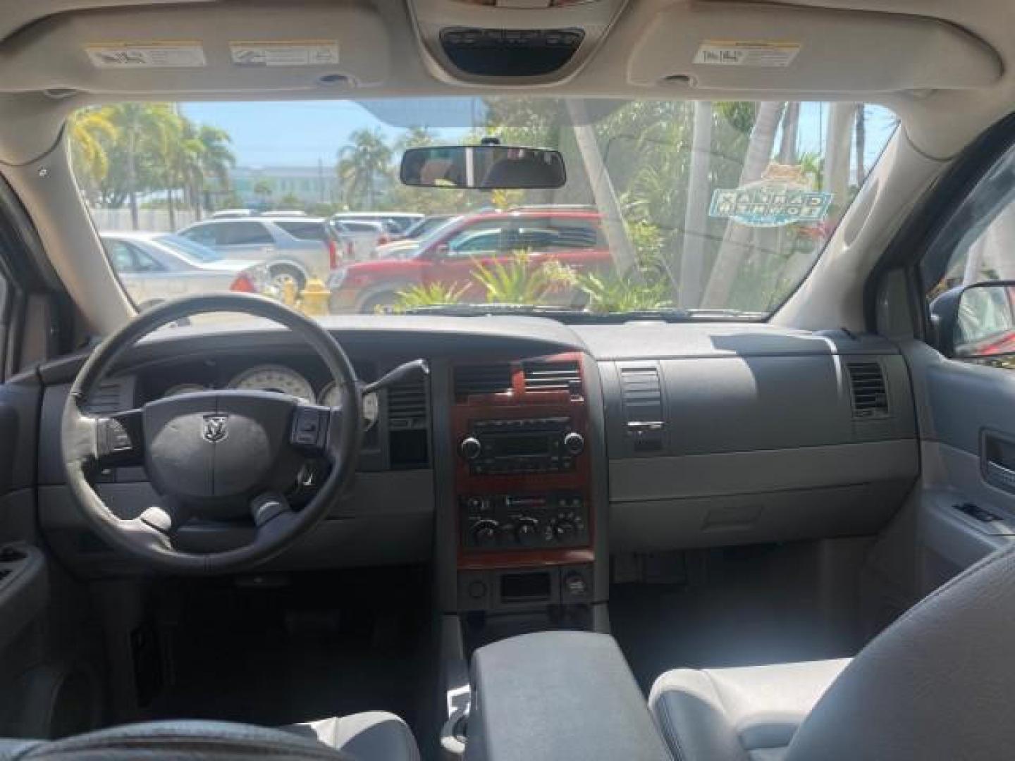 2006 Flame Red /Med Slate Gray Dodge Durango 3RD ROW SLT LOW MILES 34,957 (1D4HD48N06F) with an 4.7L V8 Magnum Engine engine, Automatic transmission, located at 4701 North Dixie Hwy, Pompano Beach, FL, 33064, (954) 422-2889, 26.240938, -80.123474 - OUR WEBPAGE FLORIDACARS1.COM HAS OVER 100 PHOTOS AND FREE CARFAX LINK 2006 DODGE DURANGO SLT 50 SERVICE RECORDS FULLY MAINTANED VIN: 1D4HD48N06F182662 1 D 4 H D 4 8 N 0 6 F 1 8 2 6 6 2 4 DOOR WAGON/SPORT UTILITY 4.7L V8 F OHV GASOLINE REAR WHEEL DRIVE Top Features Alloy Wheels Rear Entertainment Sys - Photo#67