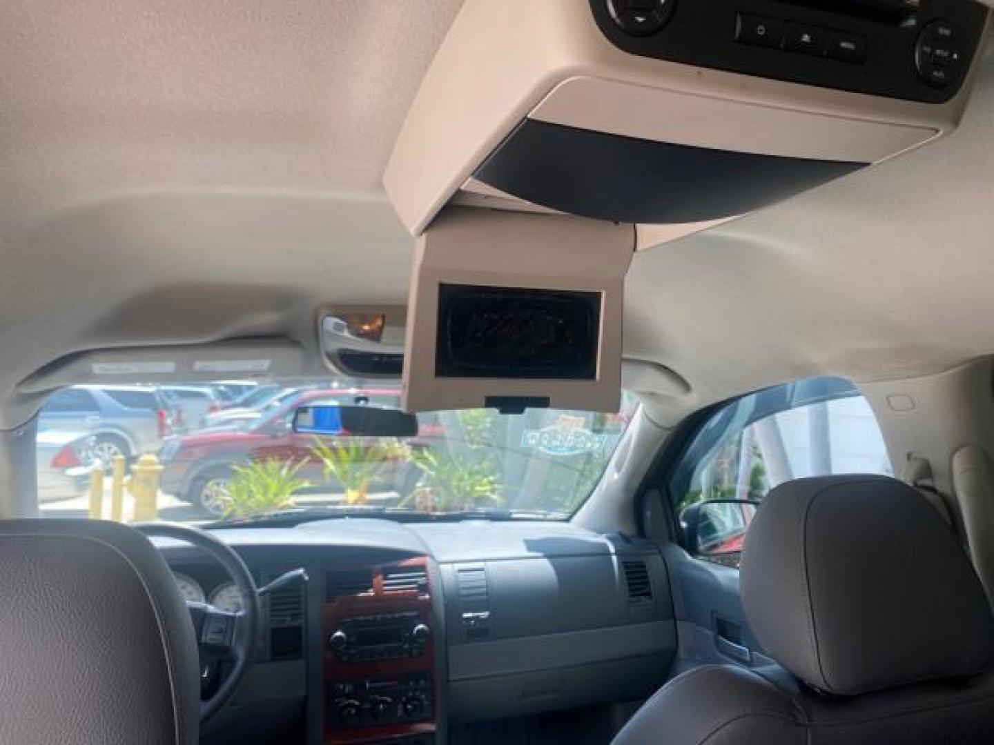 2006 Flame Red /Med Slate Gray Dodge Durango 3RD ROW SLT LOW MILES 34,957 (1D4HD48N06F) with an 4.7L V8 Magnum Engine engine, Automatic transmission, located at 4701 North Dixie Hwy, Pompano Beach, FL, 33064, (954) 422-2889, 26.240938, -80.123474 - OUR WEBPAGE FLORIDACARS1.COM HAS OVER 100 PHOTOS AND FREE CARFAX LINK 2006 DODGE DURANGO SLT 50 SERVICE RECORDS FULLY MAINTANED VIN: 1D4HD48N06F182662 1 D 4 H D 4 8 N 0 6 F 1 8 2 6 6 2 4 DOOR WAGON/SPORT UTILITY 4.7L V8 F OHV GASOLINE REAR WHEEL DRIVE Top Features Alloy Wheels Rear Entertainment Sys - Photo#73