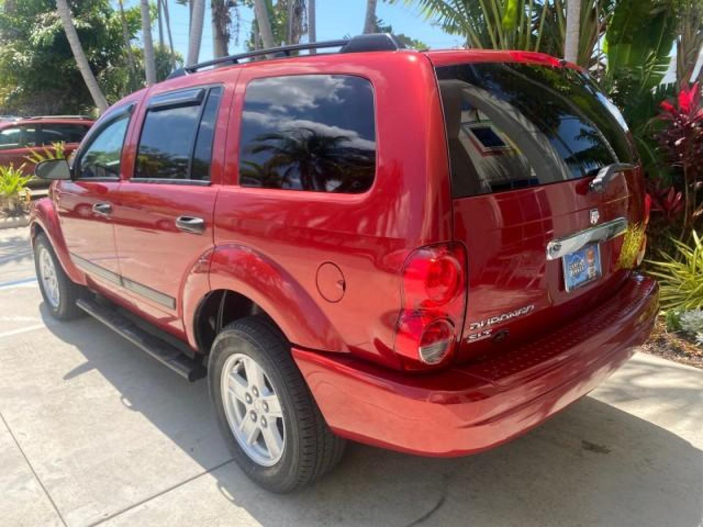 2006 Flame Red /Med Slate Gray Dodge Durango 3RD ROW SLT LOW MILES 34,957 (1D4HD48N06F) with an 4.7L V8 Magnum Engine engine, Automatic transmission, located at 4701 North Dixie Hwy, Pompano Beach, FL, 33064, (954) 422-2889, 26.240938, -80.123474 - OUR WEBPAGE FLORIDACARS1.COM HAS OVER 100 PHOTOS AND FREE CARFAX LINK 2006 DODGE DURANGO SLT 50 SERVICE RECORDS FULLY MAINTANED VIN: 1D4HD48N06F182662 1 D 4 H D 4 8 N 0 6 F 1 8 2 6 6 2 4 DOOR WAGON/SPORT UTILITY 4.7L V8 F OHV GASOLINE REAR WHEEL DRIVE Top Features Alloy Wheels Rear Entertainment Sys - Photo#78