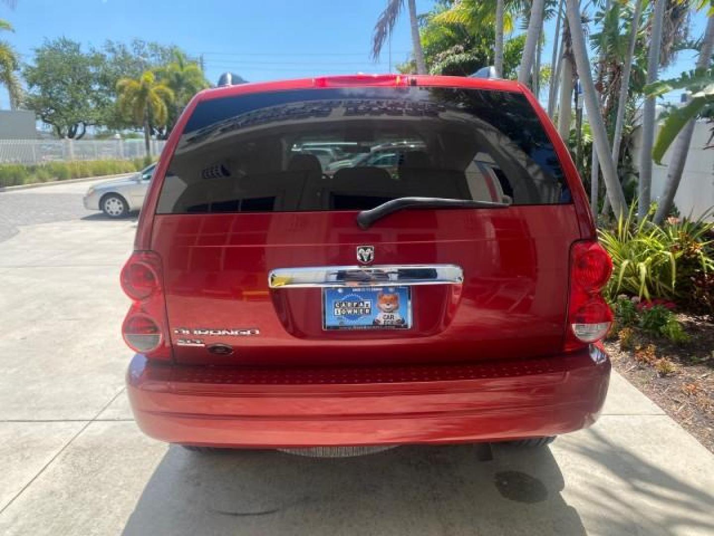 2006 Flame Red /Med Slate Gray Dodge Durango 3RD ROW SLT LOW MILES 34,957 (1D4HD48N06F) with an 4.7L V8 Magnum Engine engine, Automatic transmission, located at 4701 North Dixie Hwy, Pompano Beach, FL, 33064, (954) 422-2889, 26.240938, -80.123474 - OUR WEBPAGE FLORIDACARS1.COM HAS OVER 100 PHOTOS AND FREE CARFAX LINK 2006 DODGE DURANGO SLT 50 SERVICE RECORDS FULLY MAINTANED VIN: 1D4HD48N06F182662 1 D 4 H D 4 8 N 0 6 F 1 8 2 6 6 2 4 DOOR WAGON/SPORT UTILITY 4.7L V8 F OHV GASOLINE REAR WHEEL DRIVE Top Features Alloy Wheels Rear Entertainment Sys - Photo#79