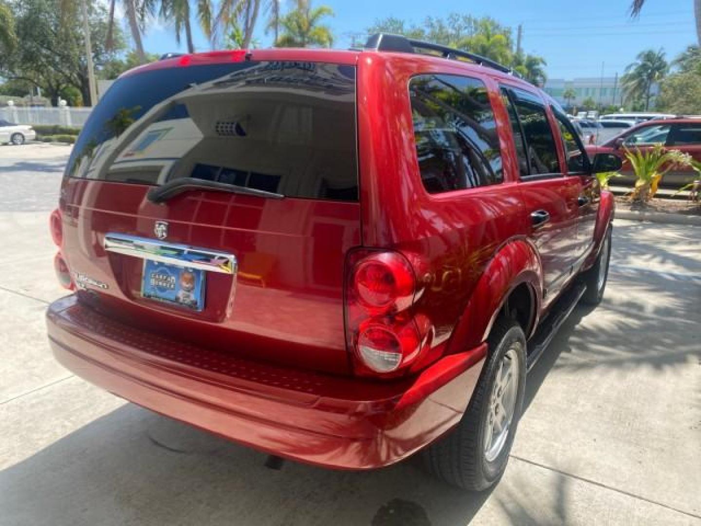2006 Flame Red /Med Slate Gray Dodge Durango 3RD ROW SLT LOW MILES 34,957 (1D4HD48N06F) with an 4.7L V8 Magnum Engine engine, Automatic transmission, located at 4701 North Dixie Hwy, Pompano Beach, FL, 33064, (954) 422-2889, 26.240938, -80.123474 - OUR WEBPAGE FLORIDACARS1.COM HAS OVER 100 PHOTOS AND FREE CARFAX LINK 2006 DODGE DURANGO SLT 50 SERVICE RECORDS FULLY MAINTANED VIN: 1D4HD48N06F182662 1 D 4 H D 4 8 N 0 6 F 1 8 2 6 6 2 4 DOOR WAGON/SPORT UTILITY 4.7L V8 F OHV GASOLINE REAR WHEEL DRIVE Top Features Alloy Wheels Rear Entertainment Sys - Photo#80