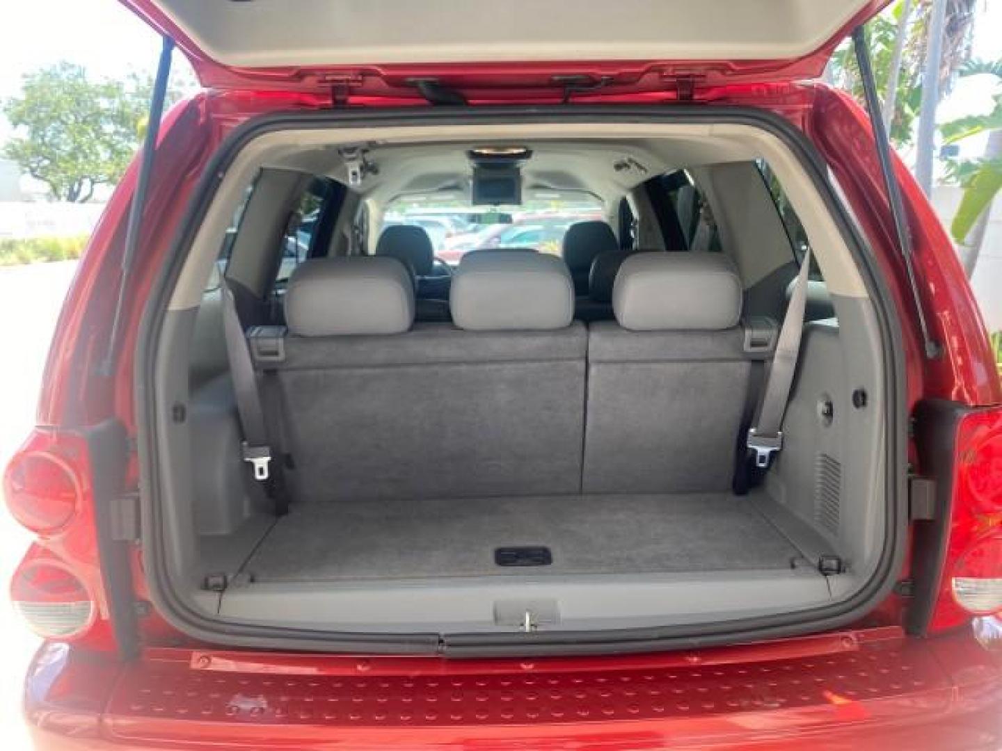 2006 Flame Red /Med Slate Gray Dodge Durango 3RD ROW SLT LOW MILES 34,957 (1D4HD48N06F) with an 4.7L V8 Magnum Engine engine, Automatic transmission, located at 4701 North Dixie Hwy, Pompano Beach, FL, 33064, (954) 422-2889, 26.240938, -80.123474 - OUR WEBPAGE FLORIDACARS1.COM HAS OVER 100 PHOTOS AND FREE CARFAX LINK 2006 DODGE DURANGO SLT 50 SERVICE RECORDS FULLY MAINTANED VIN: 1D4HD48N06F182662 1 D 4 H D 4 8 N 0 6 F 1 8 2 6 6 2 4 DOOR WAGON/SPORT UTILITY 4.7L V8 F OHV GASOLINE REAR WHEEL DRIVE Top Features Alloy Wheels Rear Entertainment Sys - Photo#84