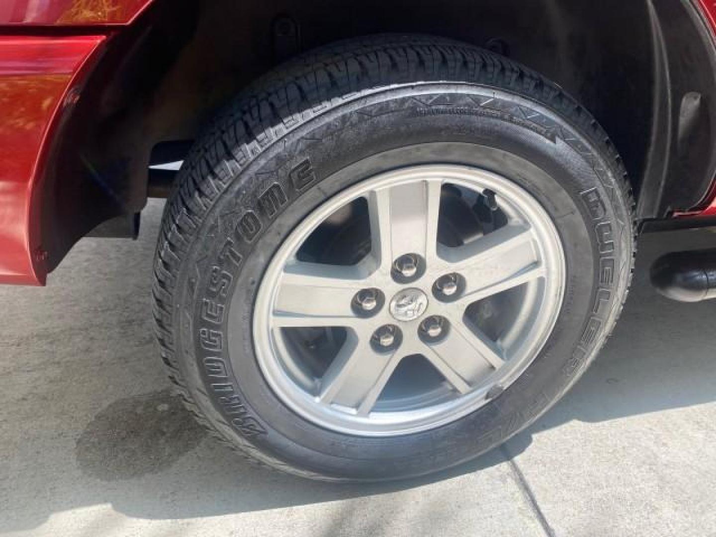 2006 Flame Red /Med Slate Gray Dodge Durango 3RD ROW SLT LOW MILES 34,957 (1D4HD48N06F) with an 4.7L V8 Magnum Engine engine, Automatic transmission, located at 4701 North Dixie Hwy, Pompano Beach, FL, 33064, (954) 422-2889, 26.240938, -80.123474 - OUR WEBPAGE FLORIDACARS1.COM HAS OVER 100 PHOTOS AND FREE CARFAX LINK 2006 DODGE DURANGO SLT 50 SERVICE RECORDS FULLY MAINTANED VIN: 1D4HD48N06F182662 1 D 4 H D 4 8 N 0 6 F 1 8 2 6 6 2 4 DOOR WAGON/SPORT UTILITY 4.7L V8 F OHV GASOLINE REAR WHEEL DRIVE Top Features Alloy Wheels Rear Entertainment Sys - Photo#87