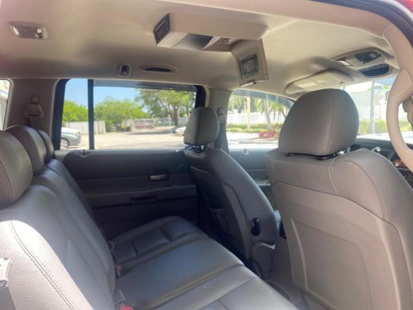 2006 Flame Red /Med Slate Gray Dodge Durango 3RD ROW SLT LOW MILES 34,957 (1D4HD48N06F) with an 4.7L V8 Magnum Engine engine, Automatic transmission, located at 4701 North Dixie Hwy, Pompano Beach, FL, 33064, (954) 422-2889, 26.240938, -80.123474 - OUR WEBPAGE FLORIDACARS1.COM HAS OVER 100 PHOTOS AND FREE CARFAX LINK 2006 DODGE DURANGO SLT 50 SERVICE RECORDS FULLY MAINTANED VIN: 1D4HD48N06F182662 1 D 4 H D 4 8 N 0 6 F 1 8 2 6 6 2 4 DOOR WAGON/SPORT UTILITY 4.7L V8 F OHV GASOLINE REAR WHEEL DRIVE Top Features Alloy Wheels Rear Entertainment Sys - Photo#91