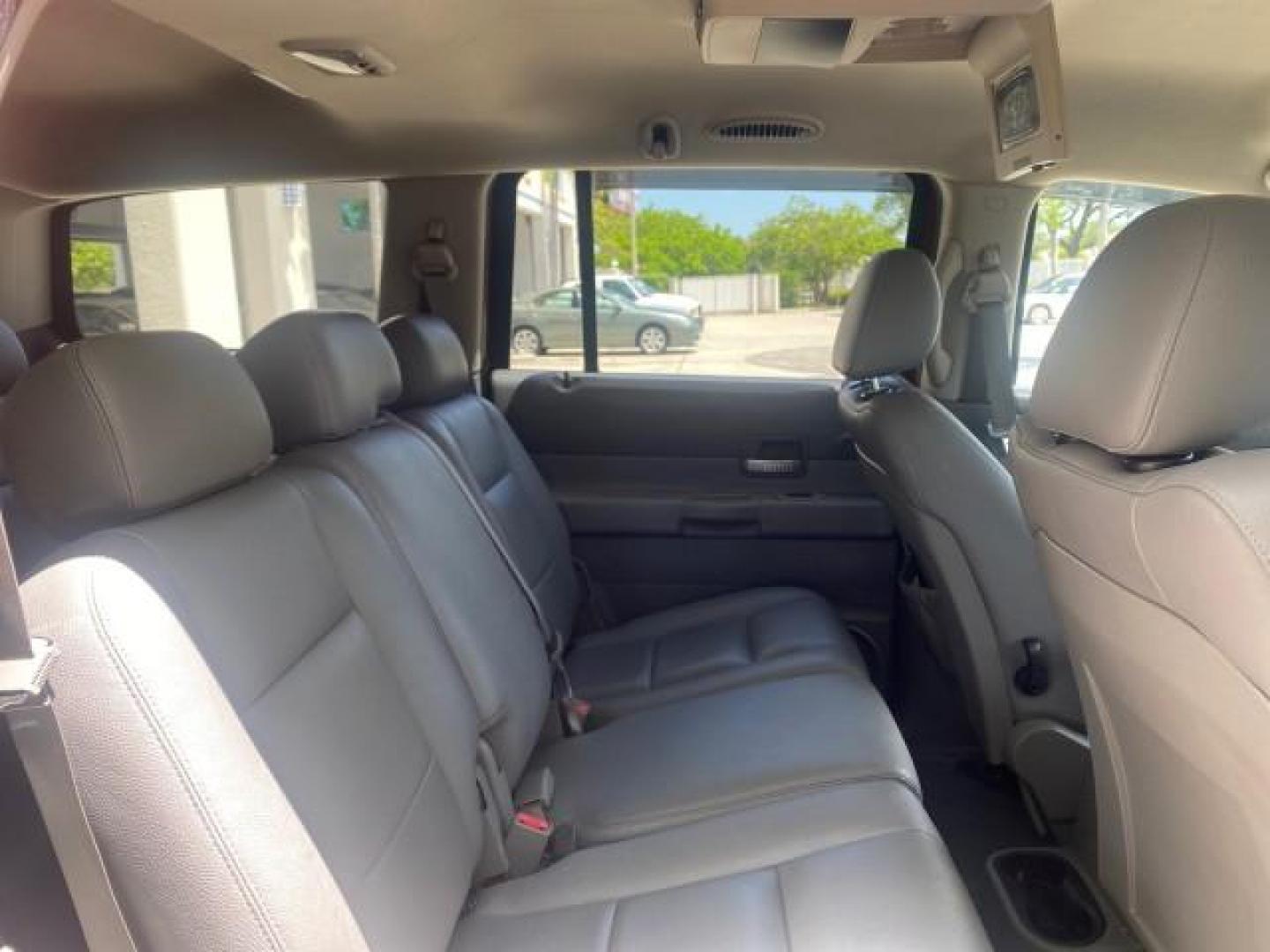 2006 Flame Red /Med Slate Gray Dodge Durango 3RD ROW SLT LOW MILES 34,957 (1D4HD48N06F) with an 4.7L V8 Magnum Engine engine, Automatic transmission, located at 4701 North Dixie Hwy, Pompano Beach, FL, 33064, (954) 422-2889, 26.240938, -80.123474 - OUR WEBPAGE FLORIDACARS1.COM HAS OVER 100 PHOTOS AND FREE CARFAX LINK 2006 DODGE DURANGO SLT 50 SERVICE RECORDS FULLY MAINTANED VIN: 1D4HD48N06F182662 1 D 4 H D 4 8 N 0 6 F 1 8 2 6 6 2 4 DOOR WAGON/SPORT UTILITY 4.7L V8 F OHV GASOLINE REAR WHEEL DRIVE Top Features Alloy Wheels Rear Entertainment Sys - Photo#92