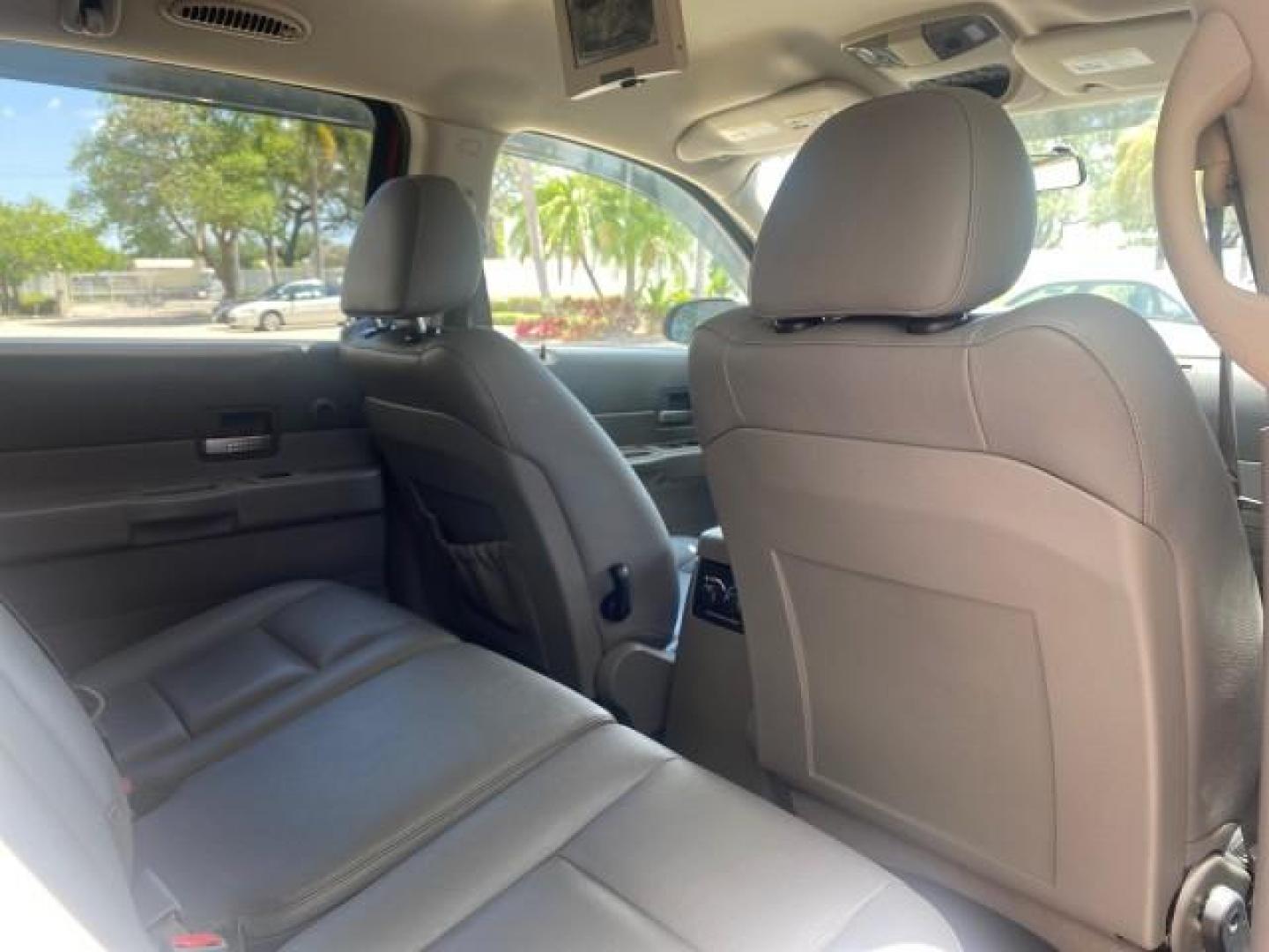 2006 Flame Red /Med Slate Gray Dodge Durango 3RD ROW SLT LOW MILES 34,957 (1D4HD48N06F) with an 4.7L V8 Magnum Engine engine, Automatic transmission, located at 4701 North Dixie Hwy, Pompano Beach, FL, 33064, (954) 422-2889, 26.240938, -80.123474 - OUR WEBPAGE FLORIDACARS1.COM HAS OVER 100 PHOTOS AND FREE CARFAX LINK 2006 DODGE DURANGO SLT 50 SERVICE RECORDS FULLY MAINTANED VIN: 1D4HD48N06F182662 1 D 4 H D 4 8 N 0 6 F 1 8 2 6 6 2 4 DOOR WAGON/SPORT UTILITY 4.7L V8 F OHV GASOLINE REAR WHEEL DRIVE Top Features Alloy Wheels Rear Entertainment Sys - Photo#93