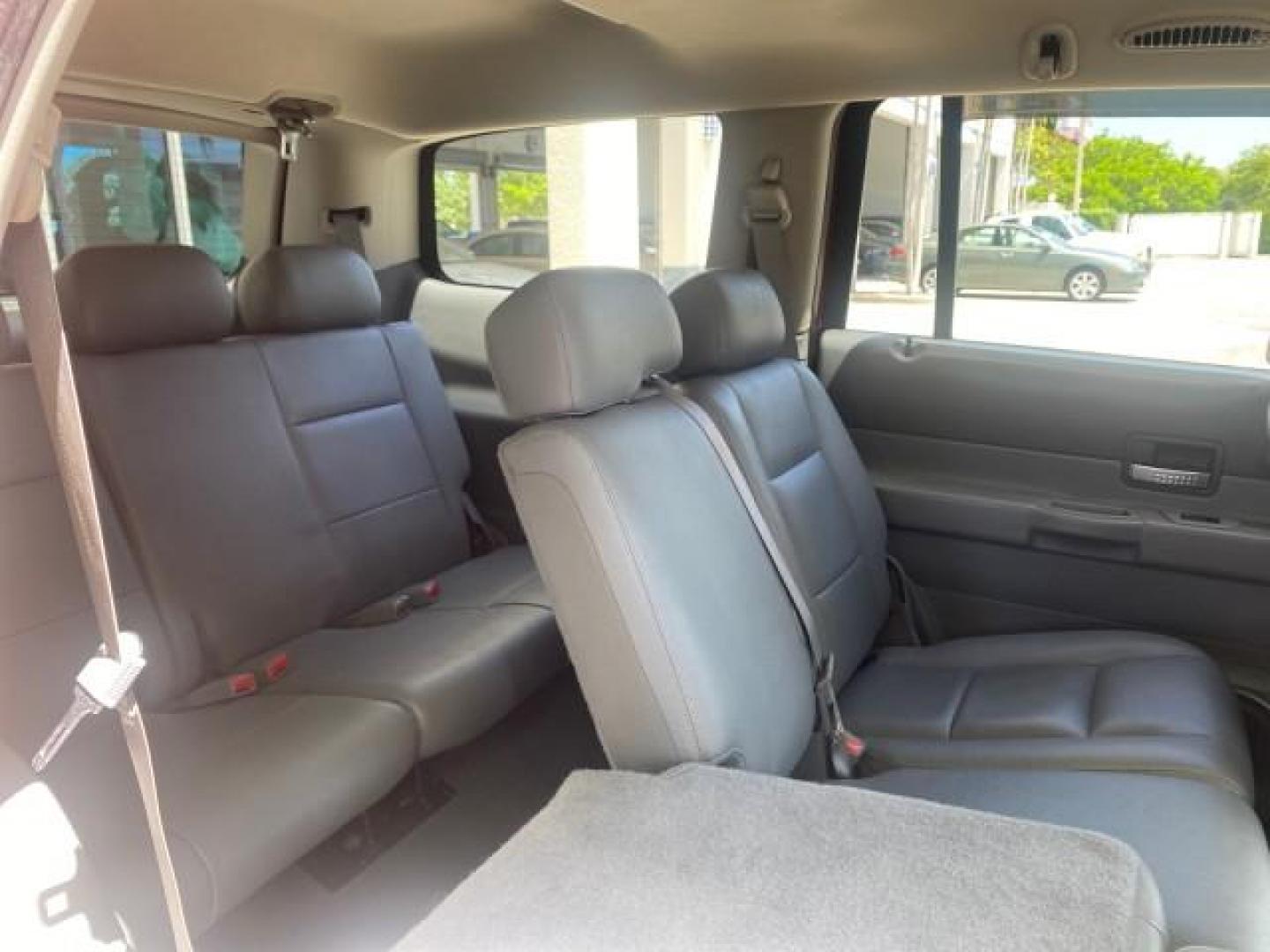2006 Flame Red /Med Slate Gray Dodge Durango 3RD ROW SLT LOW MILES 34,957 (1D4HD48N06F) with an 4.7L V8 Magnum Engine engine, Automatic transmission, located at 4701 North Dixie Hwy, Pompano Beach, FL, 33064, (954) 422-2889, 26.240938, -80.123474 - OUR WEBPAGE FLORIDACARS1.COM HAS OVER 100 PHOTOS AND FREE CARFAX LINK 2006 DODGE DURANGO SLT 50 SERVICE RECORDS FULLY MAINTANED VIN: 1D4HD48N06F182662 1 D 4 H D 4 8 N 0 6 F 1 8 2 6 6 2 4 DOOR WAGON/SPORT UTILITY 4.7L V8 F OHV GASOLINE REAR WHEEL DRIVE Top Features Alloy Wheels Rear Entertainment Sys - Photo#95