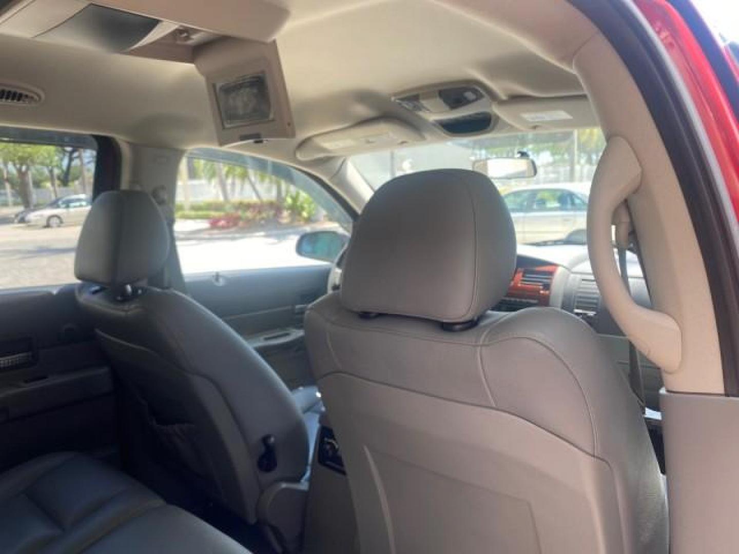 2006 Flame Red /Med Slate Gray Dodge Durango 3RD ROW SLT LOW MILES 34,957 (1D4HD48N06F) with an 4.7L V8 Magnum Engine engine, Automatic transmission, located at 4701 North Dixie Hwy, Pompano Beach, FL, 33064, (954) 422-2889, 26.240938, -80.123474 - OUR WEBPAGE FLORIDACARS1.COM HAS OVER 100 PHOTOS AND FREE CARFAX LINK 2006 DODGE DURANGO SLT 50 SERVICE RECORDS FULLY MAINTANED VIN: 1D4HD48N06F182662 1 D 4 H D 4 8 N 0 6 F 1 8 2 6 6 2 4 DOOR WAGON/SPORT UTILITY 4.7L V8 F OHV GASOLINE REAR WHEEL DRIVE Top Features Alloy Wheels Rear Entertainment Sys - Photo#96