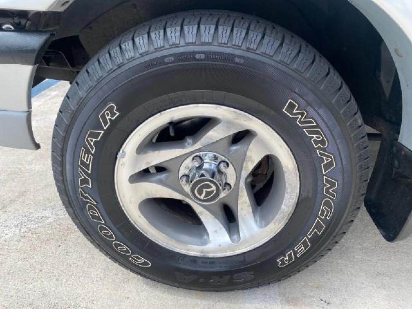 2002 Platinum Frost Metallic /Medium Graphite Mazda B-Series 3000 4WD Truck SE 1 OWNER (4F4ZR17U82T) with an 3.0L MFI V6 Engine engine, Automatic transmission, located at 4701 North Dixie Hwy, Pompano Beach, FL, 33064, (954) 422-2889, 26.240938, -80.123474 - OUR WEBPAGE FLORIDACARS1.COM HAS OVER 100 PHOTOS AND FREE CARFAX LINK 2002 MAZDA B-SERIES B3000 VIN: 4F4ZR17U82TM14728 4 F 4 Z R 1 7 U 8 2 T M 1 4 7 2 8 CLUB CAB PICKUP 3.0L V6 F GASOLINE REAR WHEEL DRIVE W/ 4X4 Top Features 4WD/AWD Cloth Seats Alloy Wheels Running Boards Bed Cover Tow Hitch Bed Lin - Photo#19