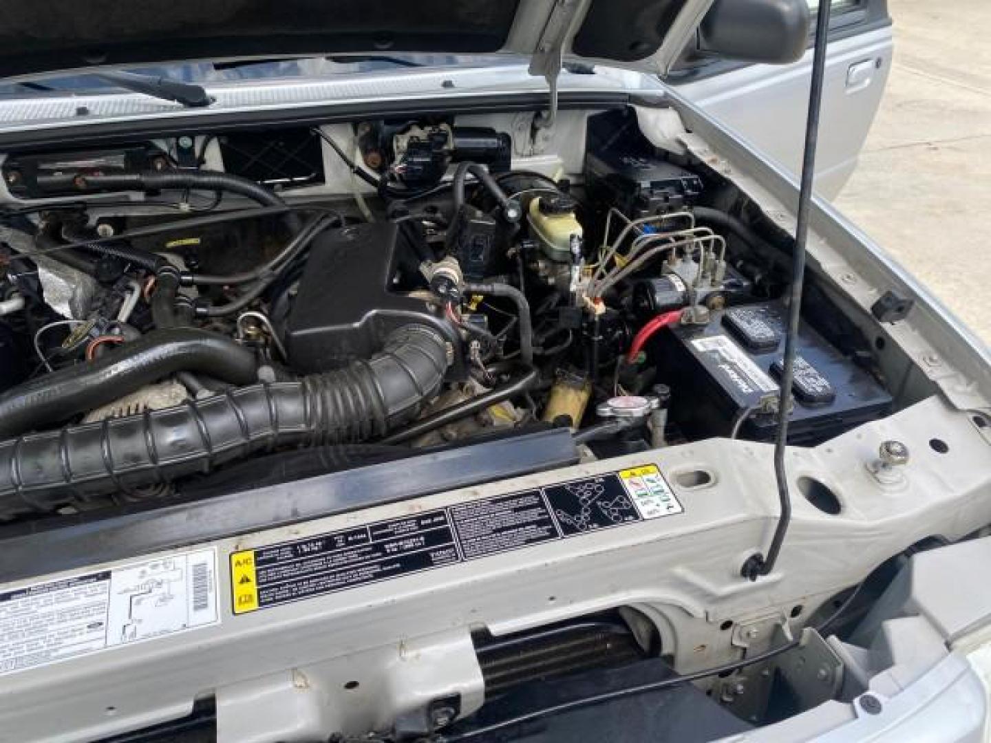 2002 Platinum Frost Metallic /Medium Graphite Mazda B-Series 3000 4WD Truck SE 1 OWNER (4F4ZR17U82T) with an 3.0L MFI V6 Engine engine, Automatic transmission, located at 4701 North Dixie Hwy, Pompano Beach, FL, 33064, (954) 422-2889, 26.240938, -80.123474 - OUR WEBPAGE FLORIDACARS1.COM HAS OVER 100 PHOTOS AND FREE CARFAX LINK 2002 MAZDA B-SERIES B3000 VIN: 4F4ZR17U82TM14728 4 F 4 Z R 1 7 U 8 2 T M 1 4 7 2 8 CLUB CAB PICKUP 3.0L V6 F GASOLINE REAR WHEEL DRIVE W/ 4X4 Top Features 4WD/AWD Cloth Seats Alloy Wheels Running Boards Bed Cover Tow Hitch Bed Lin - Photo#25