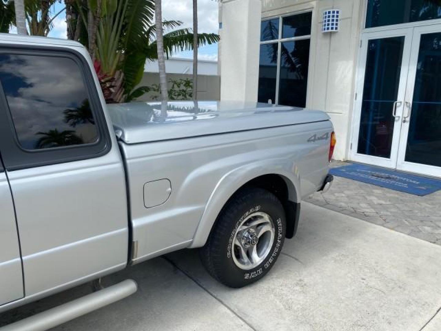 2002 Platinum Frost Metallic /Medium Graphite Mazda B-Series 3000 4WD Truck SE 1 OWNER (4F4ZR17U82T) with an 3.0L MFI V6 Engine engine, Automatic transmission, located at 4701 North Dixie Hwy, Pompano Beach, FL, 33064, (954) 422-2889, 26.240938, -80.123474 - OUR WEBPAGE FLORIDACARS1.COM HAS OVER 100 PHOTOS AND FREE CARFAX LINK 2002 MAZDA B-SERIES B3000 VIN: 4F4ZR17U82TM14728 4 F 4 Z R 1 7 U 8 2 T M 1 4 7 2 8 CLUB CAB PICKUP 3.0L V6 F GASOLINE REAR WHEEL DRIVE W/ 4X4 Top Features 4WD/AWD Cloth Seats Alloy Wheels Running Boards Bed Cover Tow Hitch Bed Lin - Photo#64