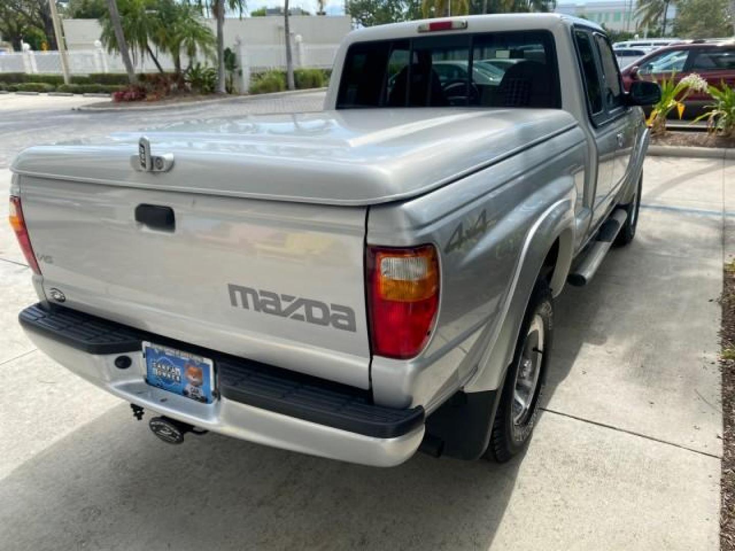 2002 Platinum Frost Metallic /Medium Graphite Mazda B-Series 3000 4WD Truck SE 1 OWNER (4F4ZR17U82T) with an 3.0L MFI V6 Engine engine, Automatic transmission, located at 4701 North Dixie Hwy, Pompano Beach, FL, 33064, (954) 422-2889, 26.240938, -80.123474 - OUR WEBPAGE FLORIDACARS1.COM HAS OVER 100 PHOTOS AND FREE CARFAX LINK 2002 MAZDA B-SERIES B3000 VIN: 4F4ZR17U82TM14728 4 F 4 Z R 1 7 U 8 2 T M 1 4 7 2 8 CLUB CAB PICKUP 3.0L V6 F GASOLINE REAR WHEEL DRIVE W/ 4X4 Top Features 4WD/AWD Cloth Seats Alloy Wheels Running Boards Bed Cover Tow Hitch Bed Lin - Photo#71