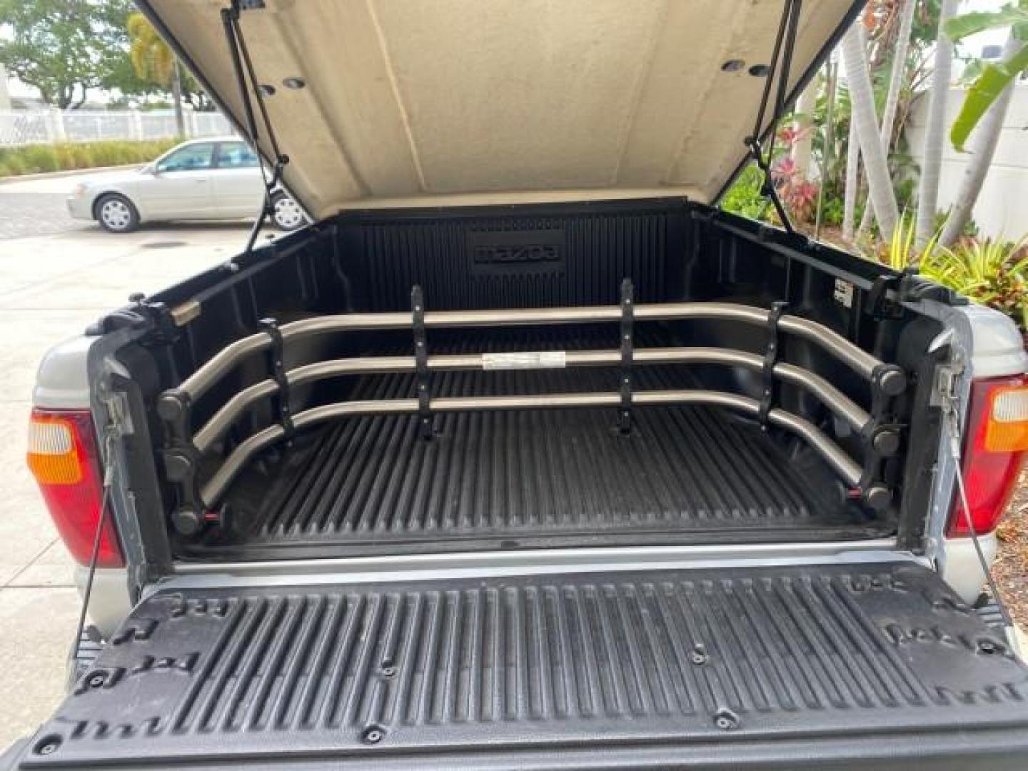 2002 Platinum Frost Metallic /Medium Graphite Mazda B-Series 3000 4WD Truck SE 1 OWNER (4F4ZR17U82T) with an 3.0L MFI V6 Engine engine, Automatic transmission, located at 4701 North Dixie Hwy, Pompano Beach, FL, 33064, (954) 422-2889, 26.240938, -80.123474 - OUR WEBPAGE FLORIDACARS1.COM HAS OVER 100 PHOTOS AND FREE CARFAX LINK 2002 MAZDA B-SERIES B3000 VIN: 4F4ZR17U82TM14728 4 F 4 Z R 1 7 U 8 2 T M 1 4 7 2 8 CLUB CAB PICKUP 3.0L V6 F GASOLINE REAR WHEEL DRIVE W/ 4X4 Top Features 4WD/AWD Cloth Seats Alloy Wheels Running Boards Bed Cover Tow Hitch Bed Lin - Photo#76