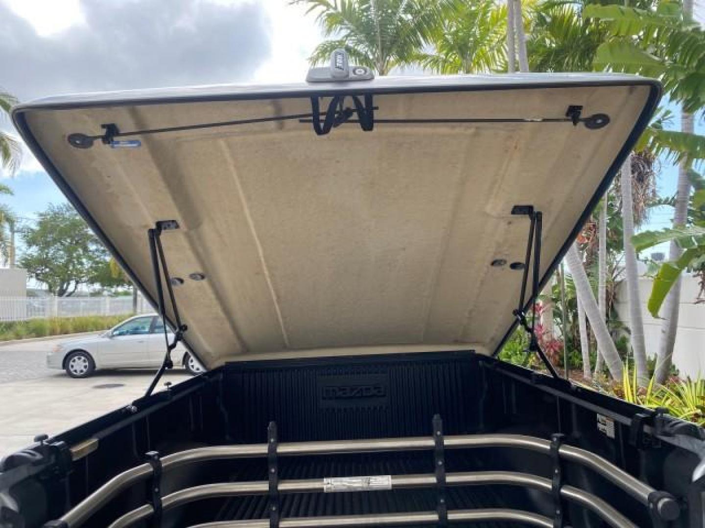 2002 Platinum Frost Metallic /Medium Graphite Mazda B-Series 3000 4WD Truck SE 1 OWNER (4F4ZR17U82T) with an 3.0L MFI V6 Engine engine, Automatic transmission, located at 4701 North Dixie Hwy, Pompano Beach, FL, 33064, (954) 422-2889, 26.240938, -80.123474 - OUR WEBPAGE FLORIDACARS1.COM HAS OVER 100 PHOTOS AND FREE CARFAX LINK 2002 MAZDA B-SERIES B3000 VIN: 4F4ZR17U82TM14728 4 F 4 Z R 1 7 U 8 2 T M 1 4 7 2 8 CLUB CAB PICKUP 3.0L V6 F GASOLINE REAR WHEEL DRIVE W/ 4X4 Top Features 4WD/AWD Cloth Seats Alloy Wheels Running Boards Bed Cover Tow Hitch Bed Lin - Photo#78
