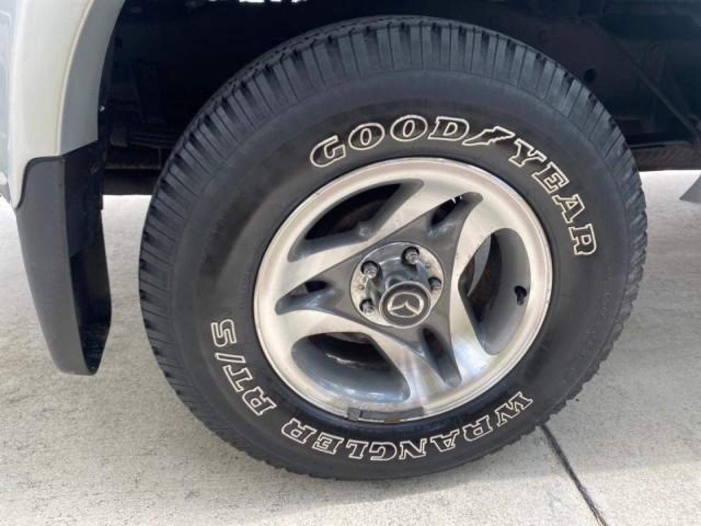 2002 Platinum Frost Metallic /Medium Graphite Mazda B-Series 3000 4WD Truck SE 1 OWNER (4F4ZR17U82T) with an 3.0L MFI V6 Engine engine, Automatic transmission, located at 4701 North Dixie Hwy, Pompano Beach, FL, 33064, (954) 422-2889, 26.240938, -80.123474 - OUR WEBPAGE FLORIDACARS1.COM HAS OVER 100 PHOTOS AND FREE CARFAX LINK 2002 MAZDA B-SERIES B3000 VIN: 4F4ZR17U82TM14728 4 F 4 Z R 1 7 U 8 2 T M 1 4 7 2 8 CLUB CAB PICKUP 3.0L V6 F GASOLINE REAR WHEEL DRIVE W/ 4X4 Top Features 4WD/AWD Cloth Seats Alloy Wheels Running Boards Bed Cover Tow Hitch Bed Lin - Photo#82