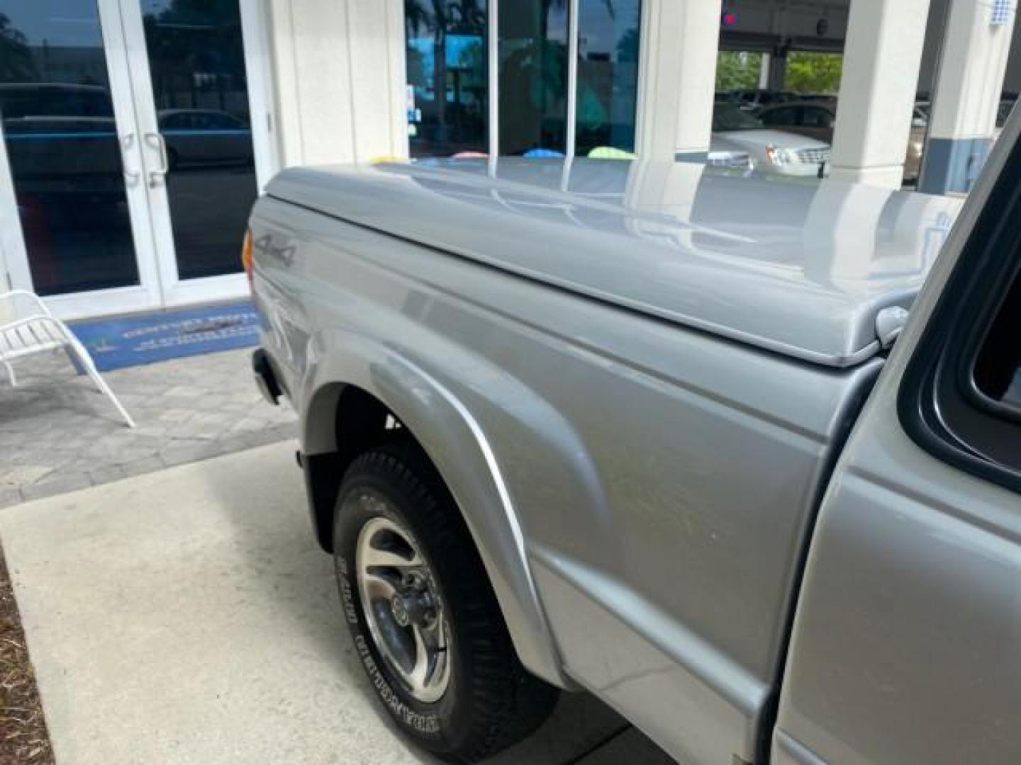2002 Platinum Frost Metallic /Medium Graphite Mazda B-Series 3000 4WD Truck SE 1 OWNER (4F4ZR17U82T) with an 3.0L MFI V6 Engine engine, Automatic transmission, located at 4701 North Dixie Hwy, Pompano Beach, FL, 33064, (954) 422-2889, 26.240938, -80.123474 - OUR WEBPAGE FLORIDACARS1.COM HAS OVER 100 PHOTOS AND FREE CARFAX LINK 2002 MAZDA B-SERIES B3000 VIN: 4F4ZR17U82TM14728 4 F 4 Z R 1 7 U 8 2 T M 1 4 7 2 8 CLUB CAB PICKUP 3.0L V6 F GASOLINE REAR WHEEL DRIVE W/ 4X4 Top Features 4WD/AWD Cloth Seats Alloy Wheels Running Boards Bed Cover Tow Hitch Bed Lin - Photo#84