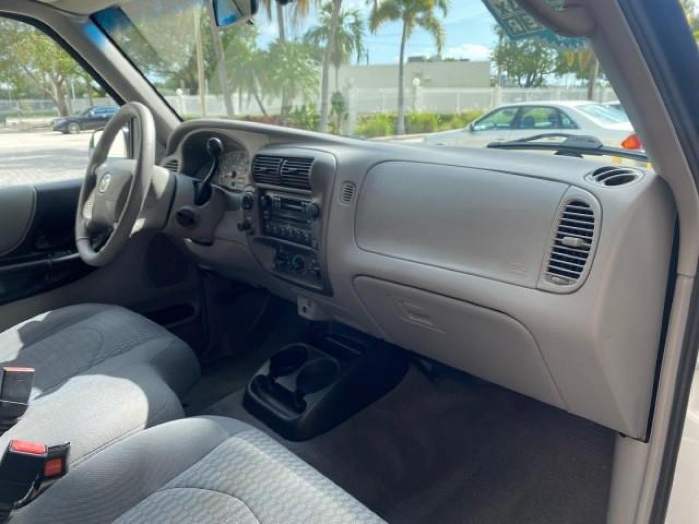 2002 Platinum Frost Metallic /Medium Graphite Mazda B-Series 3000 4WD Truck SE 1 OWNER (4F4ZR17U82T) with an 3.0L MFI V6 Engine engine, Automatic transmission, located at 4701 North Dixie Hwy, Pompano Beach, FL, 33064, (954) 422-2889, 26.240938, -80.123474 - OUR WEBPAGE FLORIDACARS1.COM HAS OVER 100 PHOTOS AND FREE CARFAX LINK 2002 MAZDA B-SERIES B3000 VIN: 4F4ZR17U82TM14728 4 F 4 Z R 1 7 U 8 2 T M 1 4 7 2 8 CLUB CAB PICKUP 3.0L V6 F GASOLINE REAR WHEEL DRIVE W/ 4X4 Top Features 4WD/AWD Cloth Seats Alloy Wheels Running Boards Bed Cover Tow Hitch Bed Lin - Photo#97