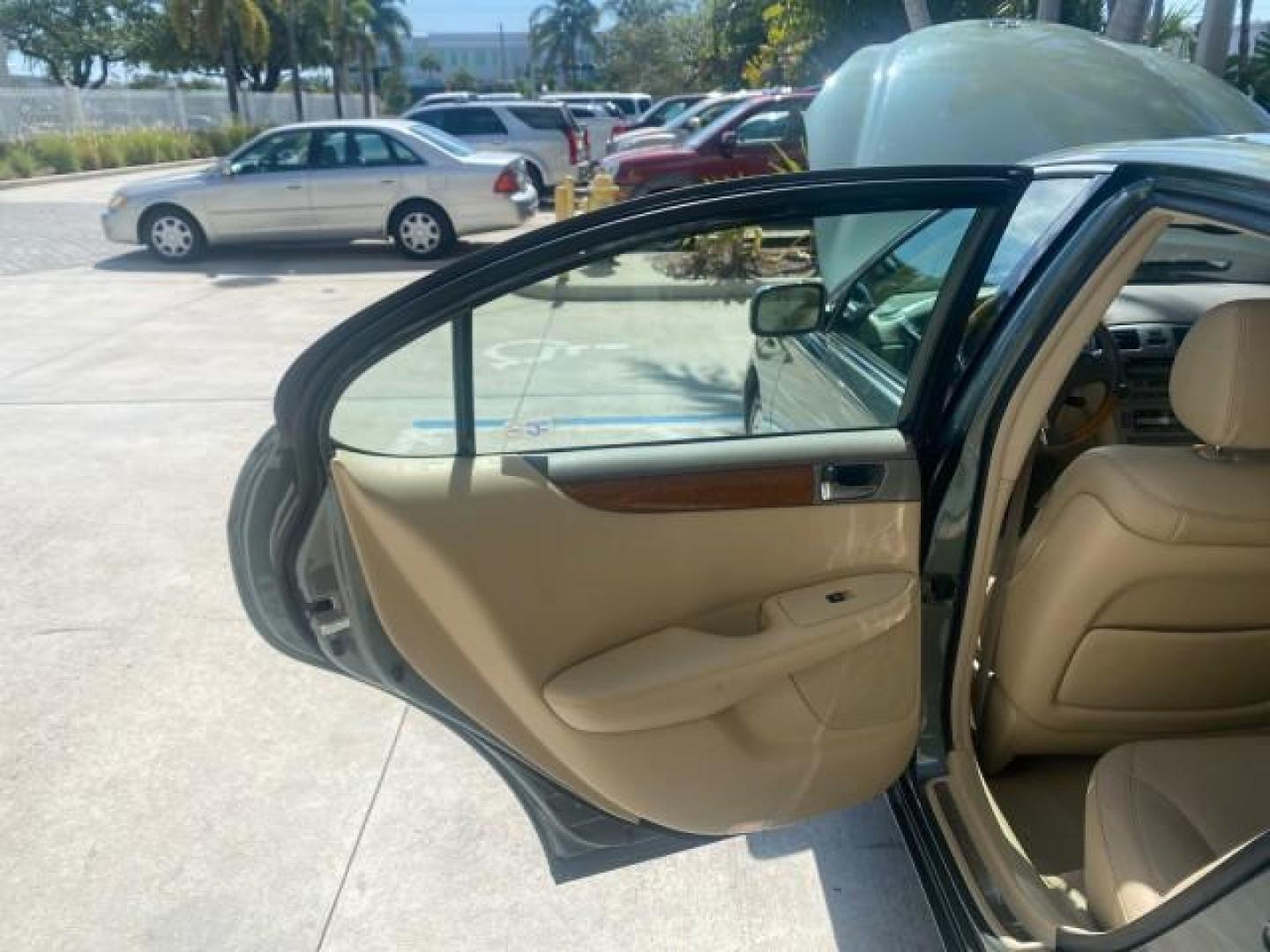 2005 Oasis Green Pearl /Ash Lexus ES 330 1 OWNER LOW MILES 62,870 (JTHBA30GX55) with an 3.3L DOHC EFI 24-Valve V6 Engine engine, Automatic transmission, located at 4701 North Dixie Hwy, Pompano Beach, FL, 33064, (954) 422-2889, 26.240938, -80.123474 - OUR WEBPAGE FLORIDACARS1.COM HAS OVER 100 PHOTOS AND FREE CARFAX LINK 2005 LEXUS ES 330 SUNROOF LOADED NON SMOKERS VIN: JTHBA30GX55134432 J T H B A 3 0 G X 5 5 1 3 4 4 3 2 SEDAN 4 DR 3.3L V6 F 24V GASOLINE 29 MPG FRONT WHEEL DRIVE Top Features A/C Seat(s) Mark Levinson Sound Alloy Wheels Memory Seat - Photo#13