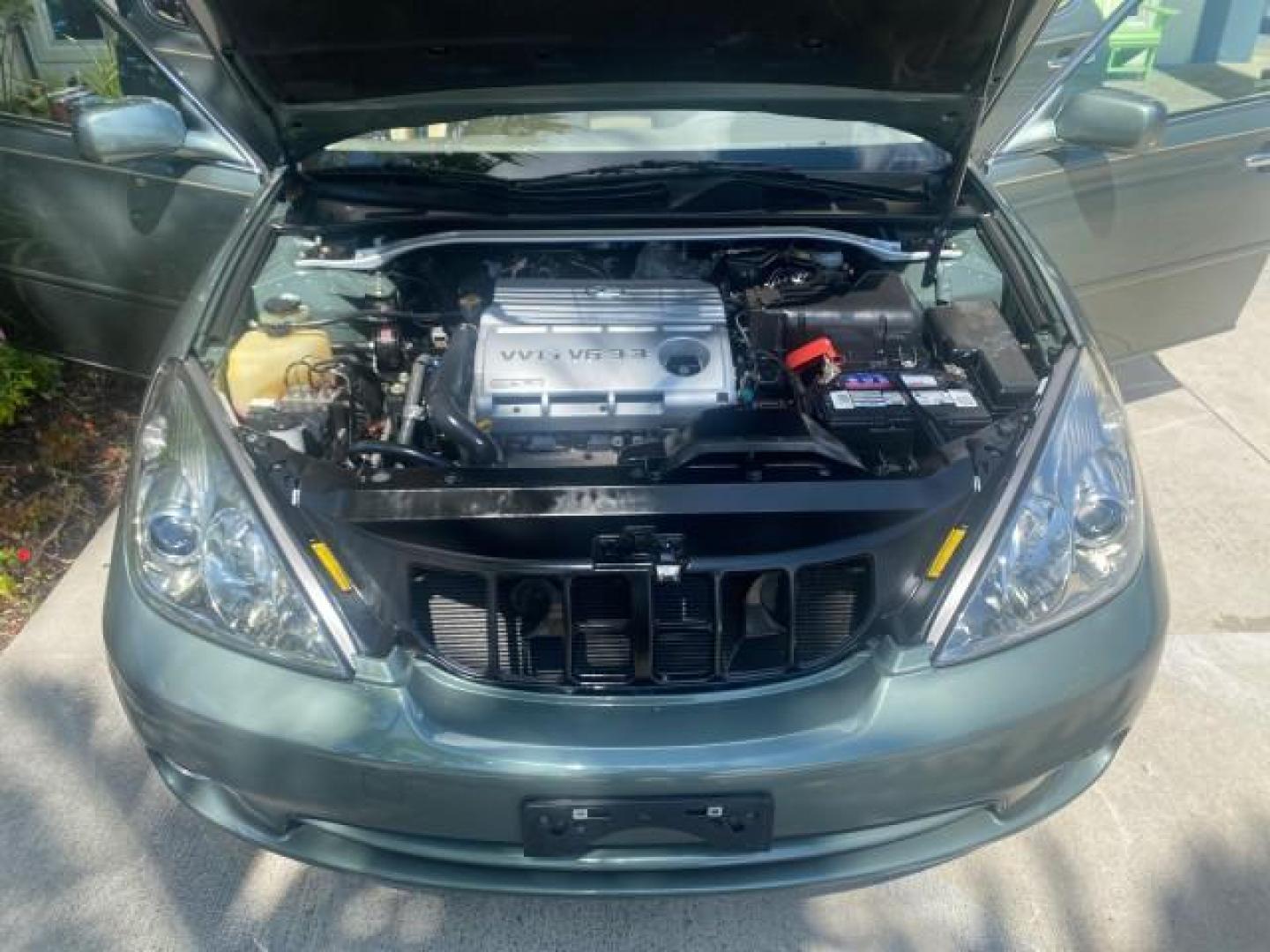 2005 Oasis Green Pearl /Ash Lexus ES 330 1 OWNER LOW MILES 62,870 (JTHBA30GX55) with an 3.3L DOHC EFI 24-Valve V6 Engine engine, Automatic transmission, located at 4701 North Dixie Hwy, Pompano Beach, FL, 33064, (954) 422-2889, 26.240938, -80.123474 - OUR WEBPAGE FLORIDACARS1.COM HAS OVER 100 PHOTOS AND FREE CARFAX LINK 2005 LEXUS ES 330 SUNROOF LOADED NON SMOKERS VIN: JTHBA30GX55134432 J T H B A 3 0 G X 5 5 1 3 4 4 3 2 SEDAN 4 DR 3.3L V6 F 24V GASOLINE 29 MPG FRONT WHEEL DRIVE Top Features A/C Seat(s) Mark Levinson Sound Alloy Wheels Memory Seat - Photo#17