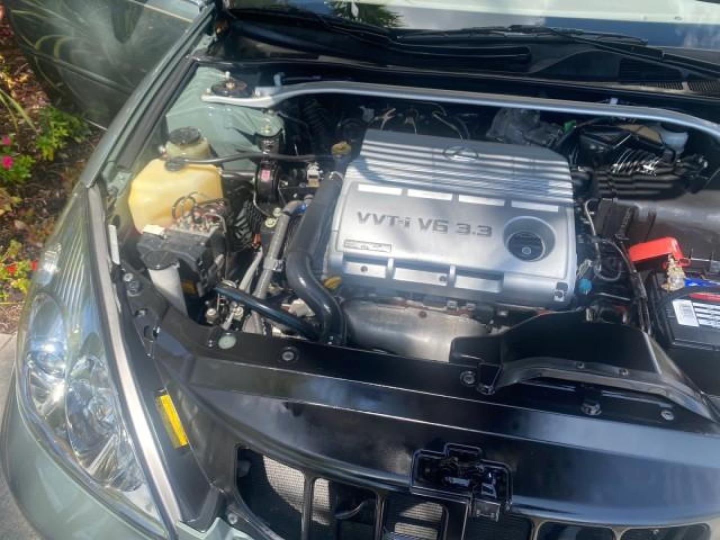 2005 Oasis Green Pearl /Ash Lexus ES 330 1 OWNER LOW MILES 62,870 (JTHBA30GX55) with an 3.3L DOHC EFI 24-Valve V6 Engine engine, Automatic transmission, located at 4701 North Dixie Hwy, Pompano Beach, FL, 33064, (954) 422-2889, 26.240938, -80.123474 - OUR WEBPAGE FLORIDACARS1.COM HAS OVER 100 PHOTOS AND FREE CARFAX LINK 2005 LEXUS ES 330 SUNROOF LOADED NON SMOKERS VIN: JTHBA30GX55134432 J T H B A 3 0 G X 5 5 1 3 4 4 3 2 SEDAN 4 DR 3.3L V6 F 24V GASOLINE 29 MPG FRONT WHEEL DRIVE Top Features A/C Seat(s) Mark Levinson Sound Alloy Wheels Memory Seat - Photo#25