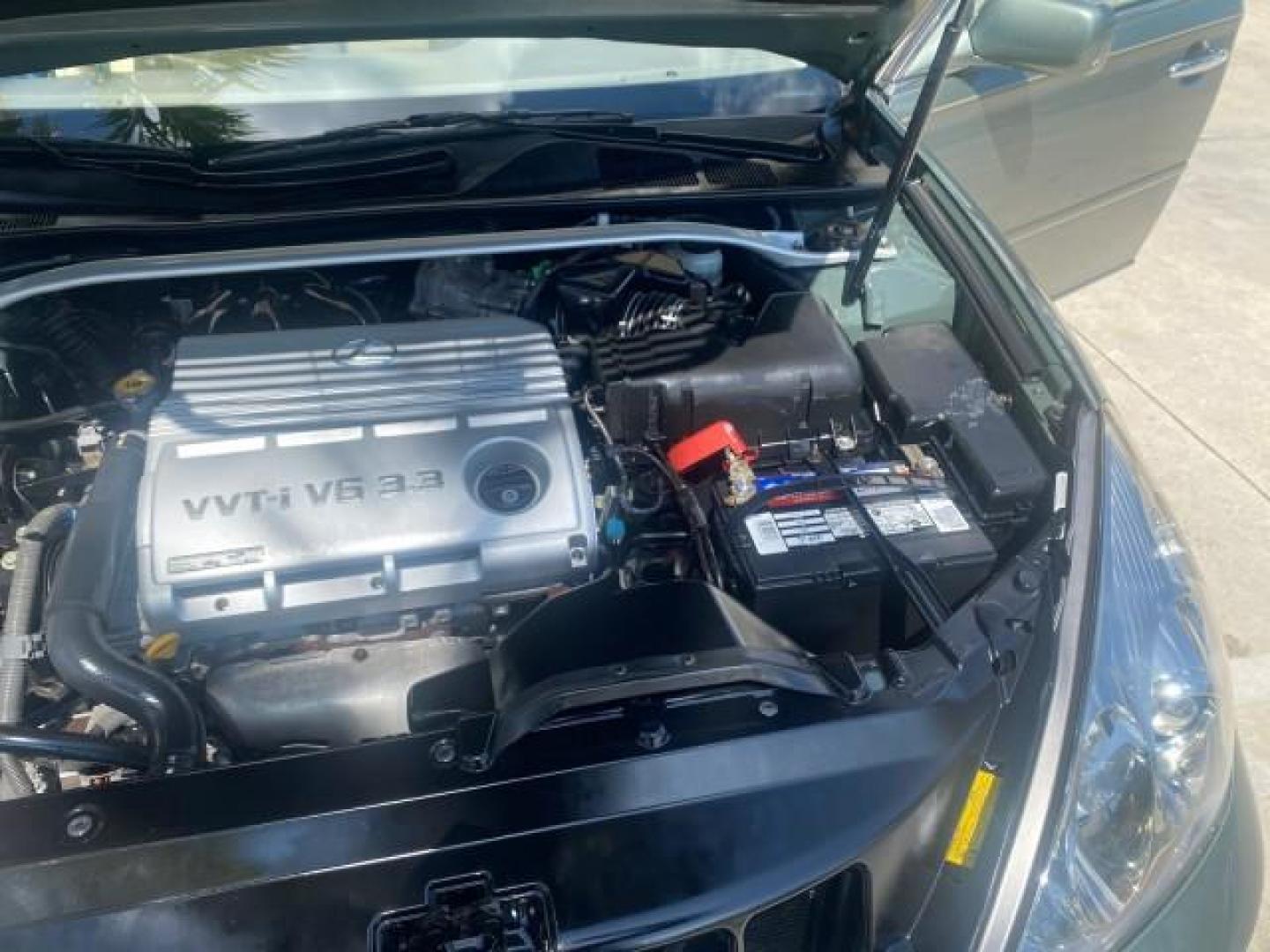 2005 Oasis Green Pearl /Ash Lexus ES 330 1 OWNER LOW MILES 62,870 (JTHBA30GX55) with an 3.3L DOHC EFI 24-Valve V6 Engine engine, Automatic transmission, located at 4701 North Dixie Hwy, Pompano Beach, FL, 33064, (954) 422-2889, 26.240938, -80.123474 - OUR WEBPAGE FLORIDACARS1.COM HAS OVER 100 PHOTOS AND FREE CARFAX LINK 2005 LEXUS ES 330 SUNROOF LOADED NON SMOKERS VIN: JTHBA30GX55134432 J T H B A 3 0 G X 5 5 1 3 4 4 3 2 SEDAN 4 DR 3.3L V6 F 24V GASOLINE 29 MPG FRONT WHEEL DRIVE Top Features A/C Seat(s) Mark Levinson Sound Alloy Wheels Memory Seat - Photo#26