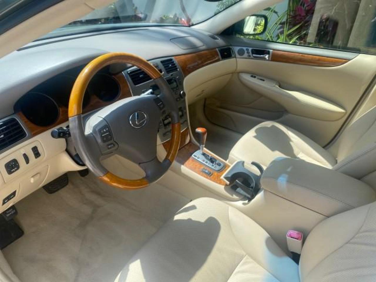 2005 Oasis Green Pearl /Ash Lexus ES 330 1 OWNER LOW MILES 62,870 (JTHBA30GX55) with an 3.3L DOHC EFI 24-Valve V6 Engine engine, Automatic transmission, located at 4701 North Dixie Hwy, Pompano Beach, FL, 33064, (954) 422-2889, 26.240938, -80.123474 - OUR WEBPAGE FLORIDACARS1.COM HAS OVER 100 PHOTOS AND FREE CARFAX LINK 2005 LEXUS ES 330 SUNROOF LOADED NON SMOKERS VIN: JTHBA30GX55134432 J T H B A 3 0 G X 5 5 1 3 4 4 3 2 SEDAN 4 DR 3.3L V6 F 24V GASOLINE 29 MPG FRONT WHEEL DRIVE Top Features A/C Seat(s) Mark Levinson Sound Alloy Wheels Memory Seat - Photo#36