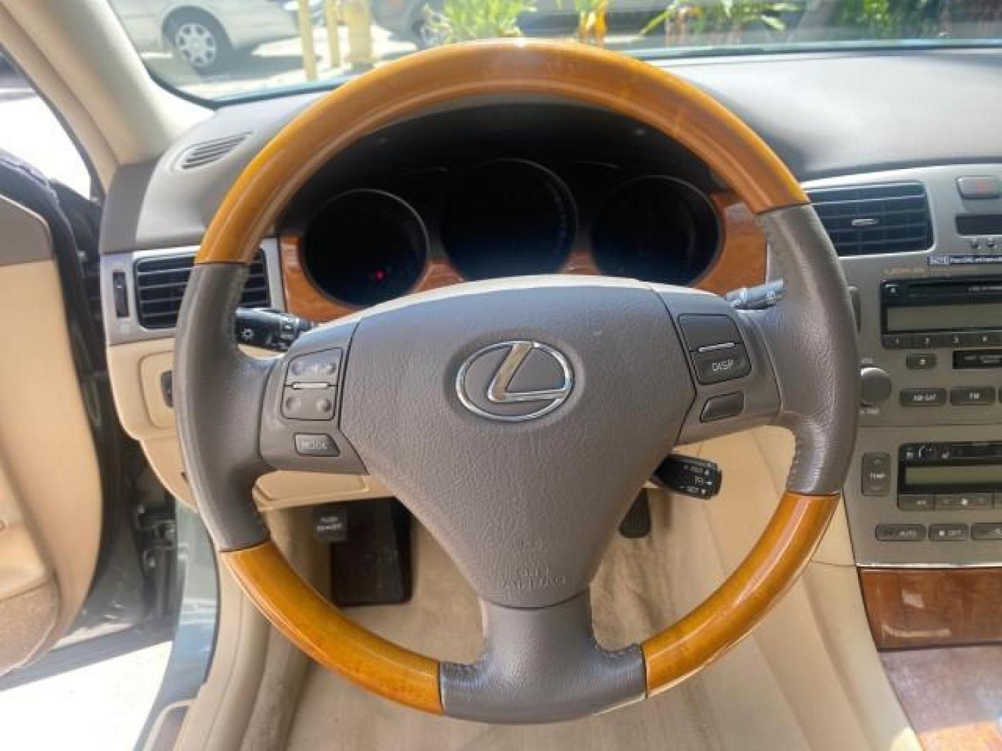 2005 Oasis Green Pearl /Ash Lexus ES 330 1 OWNER LOW MILES 62,870 (JTHBA30GX55) with an 3.3L DOHC EFI 24-Valve V6 Engine engine, Automatic transmission, located at 4701 North Dixie Hwy, Pompano Beach, FL, 33064, (954) 422-2889, 26.240938, -80.123474 - OUR WEBPAGE FLORIDACARS1.COM HAS OVER 100 PHOTOS AND FREE CARFAX LINK 2005 LEXUS ES 330 SUNROOF LOADED NON SMOKERS VIN: JTHBA30GX55134432 J T H B A 3 0 G X 5 5 1 3 4 4 3 2 SEDAN 4 DR 3.3L V6 F 24V GASOLINE 29 MPG FRONT WHEEL DRIVE Top Features A/C Seat(s) Mark Levinson Sound Alloy Wheels Memory Seat - Photo#37