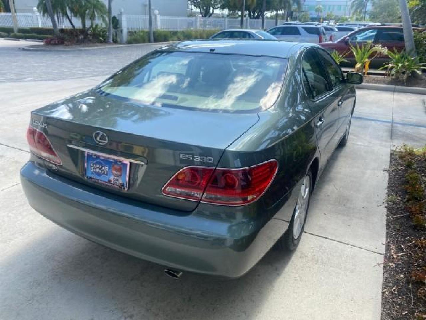 2005 Oasis Green Pearl /Ash Lexus ES 330 1 OWNER LOW MILES 62,870 (JTHBA30GX55) with an 3.3L DOHC EFI 24-Valve V6 Engine engine, Automatic transmission, located at 4701 North Dixie Hwy, Pompano Beach, FL, 33064, (954) 422-2889, 26.240938, -80.123474 - OUR WEBPAGE FLORIDACARS1.COM HAS OVER 100 PHOTOS AND FREE CARFAX LINK 2005 LEXUS ES 330 SUNROOF LOADED NON SMOKERS VIN: JTHBA30GX55134432 J T H B A 3 0 G X 5 5 1 3 4 4 3 2 SEDAN 4 DR 3.3L V6 F 24V GASOLINE 29 MPG FRONT WHEEL DRIVE Top Features A/C Seat(s) Mark Levinson Sound Alloy Wheels Memory Seat - Photo#81