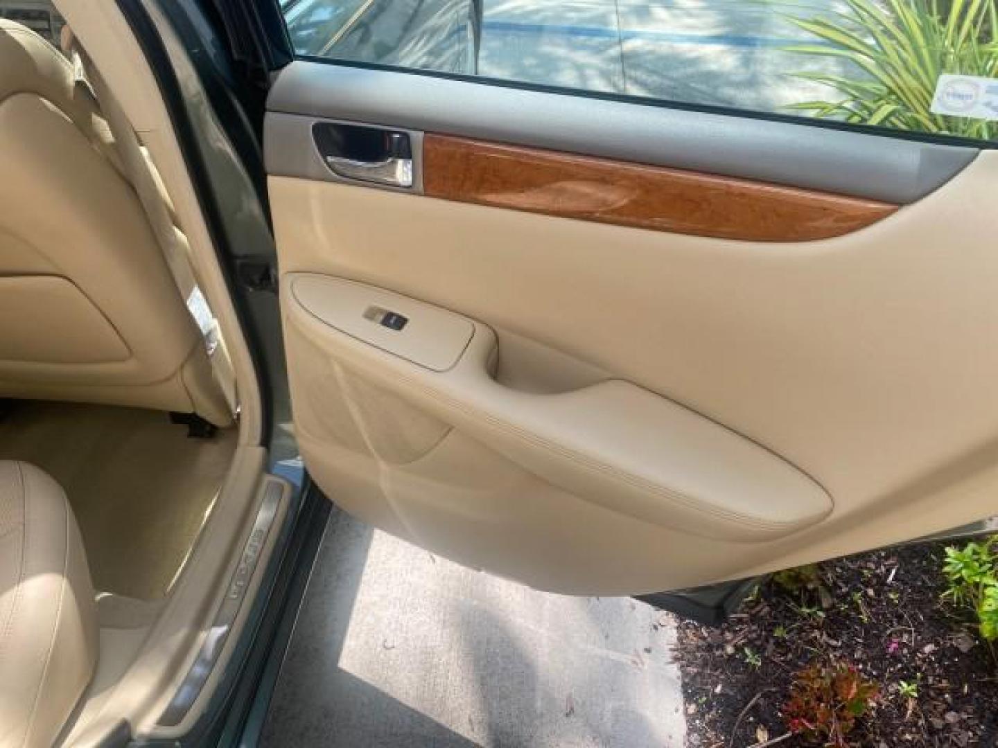 2005 Oasis Green Pearl /Ash Lexus ES 330 1 OWNER LOW MILES 62,870 (JTHBA30GX55) with an 3.3L DOHC EFI 24-Valve V6 Engine engine, Automatic transmission, located at 4701 North Dixie Hwy, Pompano Beach, FL, 33064, (954) 422-2889, 26.240938, -80.123474 - OUR WEBPAGE FLORIDACARS1.COM HAS OVER 100 PHOTOS AND FREE CARFAX LINK 2005 LEXUS ES 330 SUNROOF LOADED NON SMOKERS VIN: JTHBA30GX55134432 J T H B A 3 0 G X 5 5 1 3 4 4 3 2 SEDAN 4 DR 3.3L V6 F 24V GASOLINE 29 MPG FRONT WHEEL DRIVE Top Features A/C Seat(s) Mark Levinson Sound Alloy Wheels Memory Seat - Photo#92