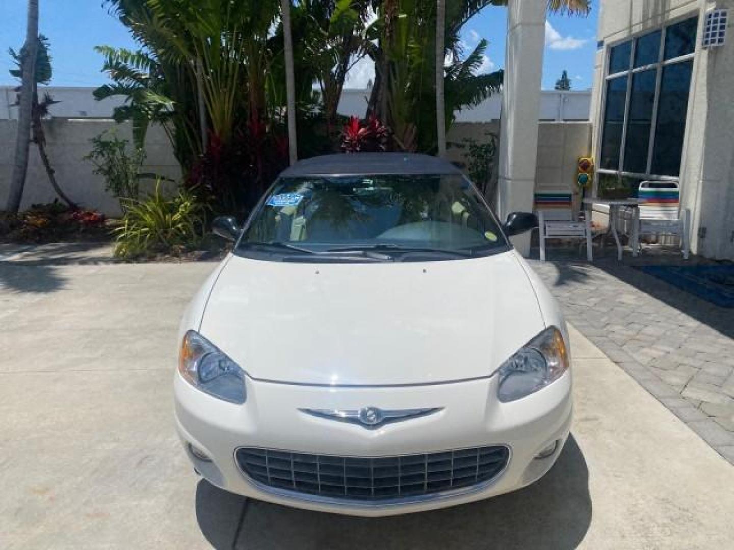 2002 Stone White /Royal Blue/Cream Chrysler Sebring Limited FL LOW MILES 34,440 (1C3EL65R52N) with an 2.7L MFI DOHC 24-Valve V6 Engine engine, Automatic transmission, located at 4701 North Dixie Hwy, Pompano Beach, FL, 33064, (954) 422-2889, 26.240938, -80.123474 - OUR WEBPAGE FLORIDACARS1.COM HAS OVER 100 PHOTOS AND FREE CARFAX LINK 2002 CHRYSLER SEBRING LIMITED VIN: 1C3EL65R52N169318 1 C 3 E L 6 5 R 5 2 N 1 6 9 3 1 8 CONVERTIBLE 2.7L V6 F DOHC GASOLINE FRONT WHEEL DRIVE Top Features Alloy Wheels Soft Top Infinity Sound System Sunroof(s) Leather Seats Basic F - Photo#2