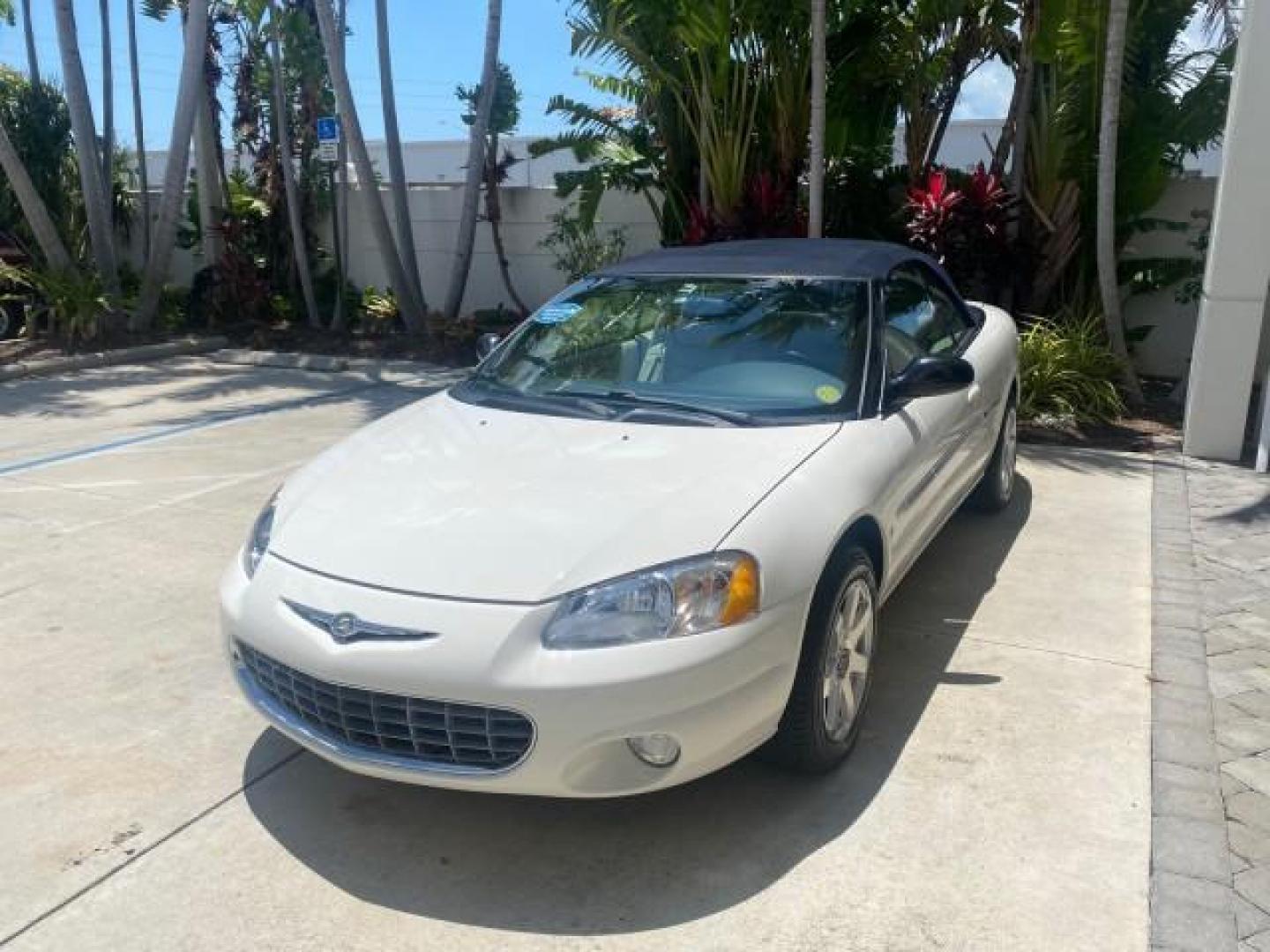 2002 Stone White /Royal Blue/Cream Chrysler Sebring Limited FL LOW MILES 34,440 (1C3EL65R52N) with an 2.7L MFI DOHC 24-Valve V6 Engine engine, Automatic transmission, located at 4701 North Dixie Hwy, Pompano Beach, FL, 33064, (954) 422-2889, 26.240938, -80.123474 - OUR WEBPAGE FLORIDACARS1.COM HAS OVER 100 PHOTOS AND FREE CARFAX LINK 2002 CHRYSLER SEBRING LIMITED VIN: 1C3EL65R52N169318 1 C 3 E L 6 5 R 5 2 N 1 6 9 3 1 8 CONVERTIBLE 2.7L V6 F DOHC GASOLINE FRONT WHEEL DRIVE Top Features Alloy Wheels Soft Top Infinity Sound System Sunroof(s) Leather Seats Basic F - Photo#3