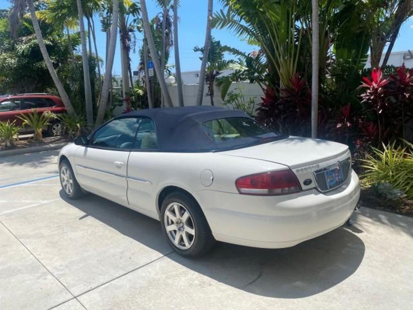 2002 Stone White /Royal Blue/Cream Chrysler Sebring Limited FL LOW MILES 34,440 (1C3EL65R52N) with an 2.7L MFI DOHC 24-Valve V6 Engine engine, Automatic transmission, located at 4701 North Dixie Hwy, Pompano Beach, FL, 33064, (954) 422-2889, 26.240938, -80.123474 - OUR WEBPAGE FLORIDACARS1.COM HAS OVER 100 PHOTOS AND FREE CARFAX LINK 2002 CHRYSLER SEBRING LIMITED VIN: 1C3EL65R52N169318 1 C 3 E L 6 5 R 5 2 N 1 6 9 3 1 8 CONVERTIBLE 2.7L V6 F DOHC GASOLINE FRONT WHEEL DRIVE Top Features Alloy Wheels Soft Top Infinity Sound System Sunroof(s) Leather Seats Basic F - Photo#5