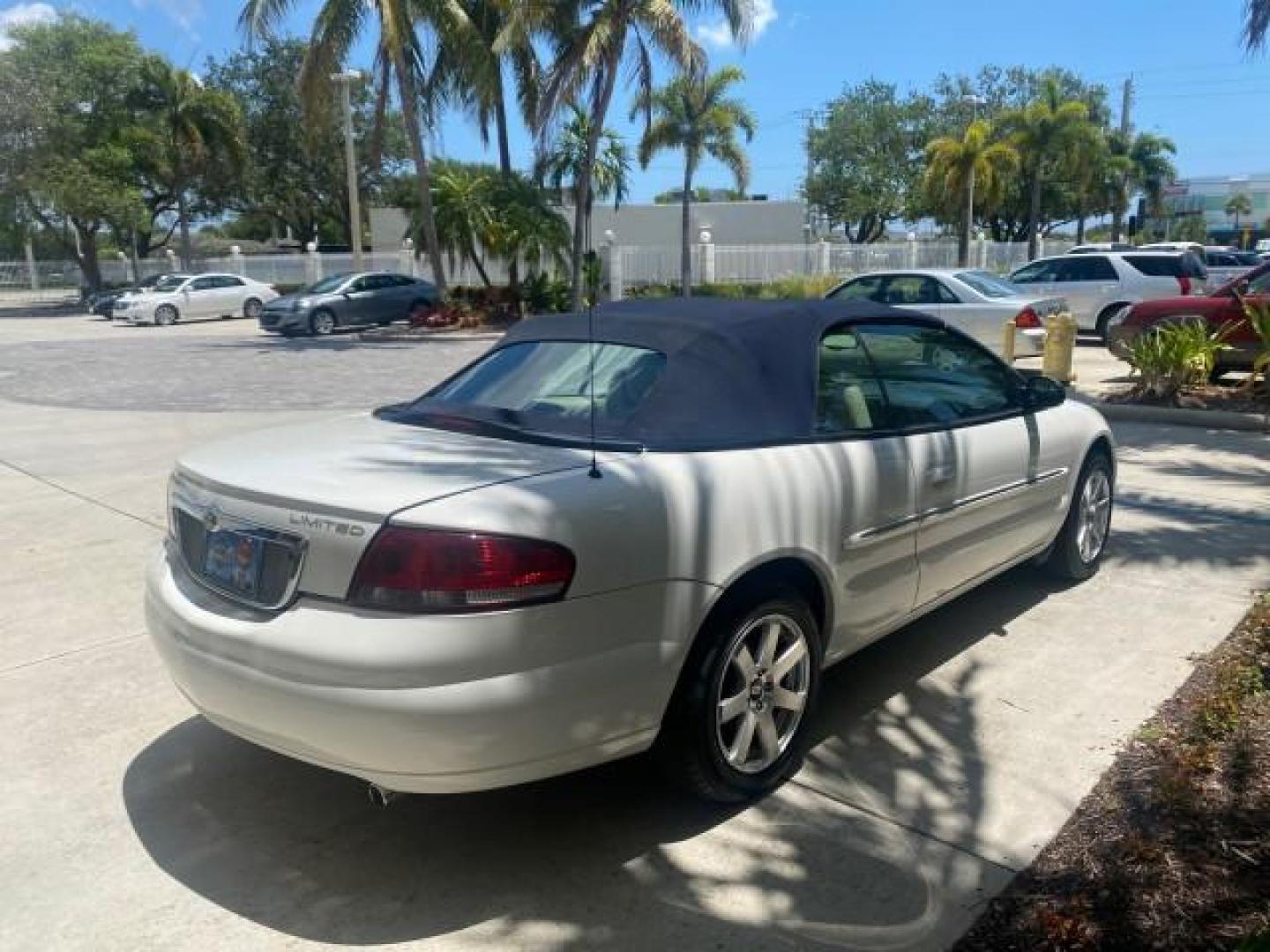 2002 Stone White /Royal Blue/Cream Chrysler Sebring Limited FL LOW MILES 34,440 (1C3EL65R52N) with an 2.7L MFI DOHC 24-Valve V6 Engine engine, Automatic transmission, located at 4701 North Dixie Hwy, Pompano Beach, FL, 33064, (954) 422-2889, 26.240938, -80.123474 - OUR WEBPAGE FLORIDACARS1.COM HAS OVER 100 PHOTOS AND FREE CARFAX LINK 2002 CHRYSLER SEBRING LIMITED VIN: 1C3EL65R52N169318 1 C 3 E L 6 5 R 5 2 N 1 6 9 3 1 8 CONVERTIBLE 2.7L V6 F DOHC GASOLINE FRONT WHEEL DRIVE Top Features Alloy Wheels Soft Top Infinity Sound System Sunroof(s) Leather Seats Basic F - Photo#7