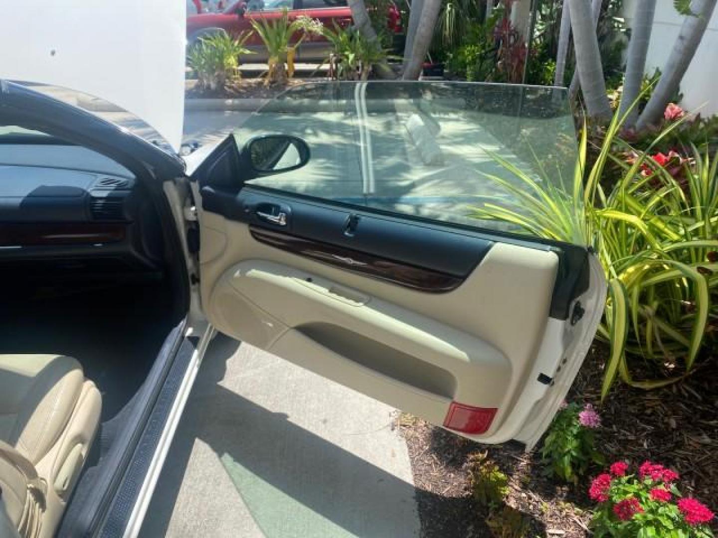 2002 Stone White /Royal Blue/Cream Chrysler Sebring Limited FL LOW MILES 34,440 (1C3EL65R52N) with an 2.7L MFI DOHC 24-Valve V6 Engine engine, Automatic transmission, located at 4701 North Dixie Hwy, Pompano Beach, FL, 33064, (954) 422-2889, 26.240938, -80.123474 - OUR WEBPAGE FLORIDACARS1.COM HAS OVER 100 PHOTOS AND FREE CARFAX LINK 2002 CHRYSLER SEBRING LIMITED VIN: 1C3EL65R52N169318 1 C 3 E L 6 5 R 5 2 N 1 6 9 3 1 8 CONVERTIBLE 2.7L V6 F DOHC GASOLINE FRONT WHEEL DRIVE Top Features Alloy Wheels Soft Top Infinity Sound System Sunroof(s) Leather Seats Basic F - Photo#11