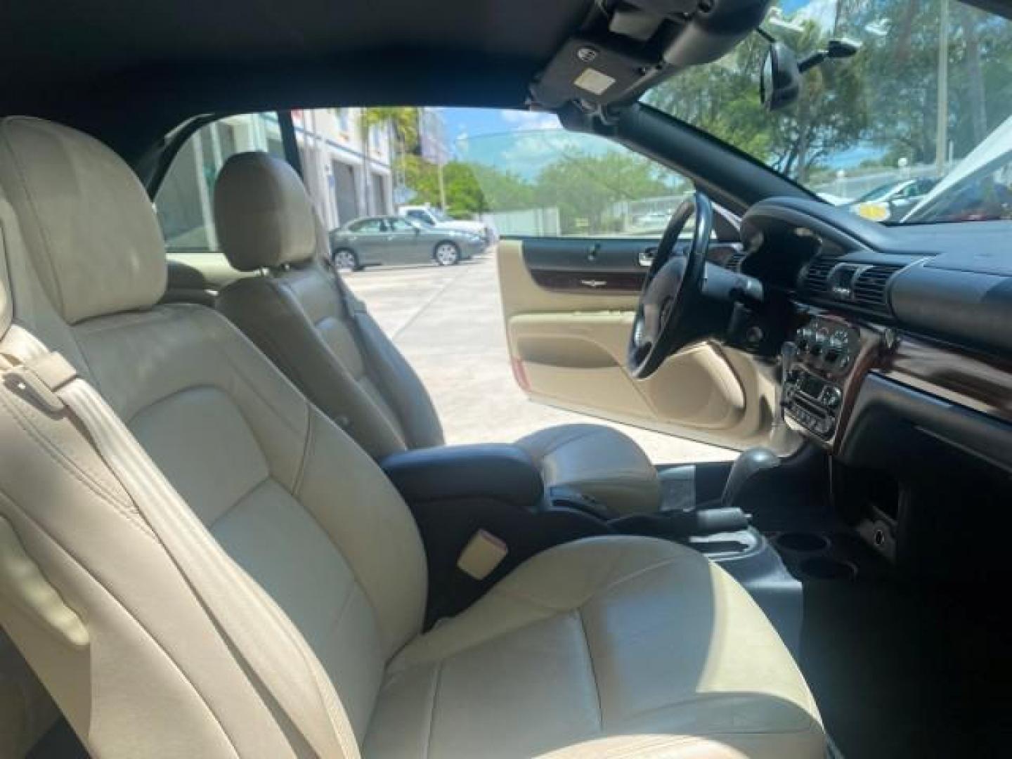 2002 Stone White /Royal Blue/Cream Chrysler Sebring Limited FL LOW MILES 34,440 (1C3EL65R52N) with an 2.7L MFI DOHC 24-Valve V6 Engine engine, Automatic transmission, located at 4701 North Dixie Hwy, Pompano Beach, FL, 33064, (954) 422-2889, 26.240938, -80.123474 - OUR WEBPAGE FLORIDACARS1.COM HAS OVER 100 PHOTOS AND FREE CARFAX LINK 2002 CHRYSLER SEBRING LIMITED VIN: 1C3EL65R52N169318 1 C 3 E L 6 5 R 5 2 N 1 6 9 3 1 8 CONVERTIBLE 2.7L V6 F DOHC GASOLINE FRONT WHEEL DRIVE Top Features Alloy Wheels Soft Top Infinity Sound System Sunroof(s) Leather Seats Basic F - Photo#12